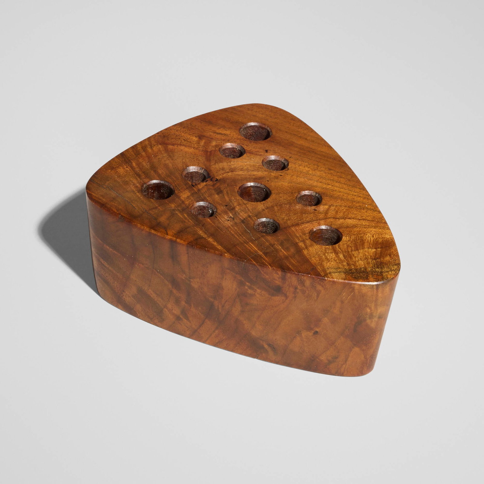 Mira Nakashima, Pen holder: Mira Nakashima Pen holder Nakashima StudioUSA, 1997American black walnut 2.25 h x 5.625 w x 4.5 d in (6 x 14 x 11 cm) Signed and dated to underside 'Mira Nakashima 9?9?97'.