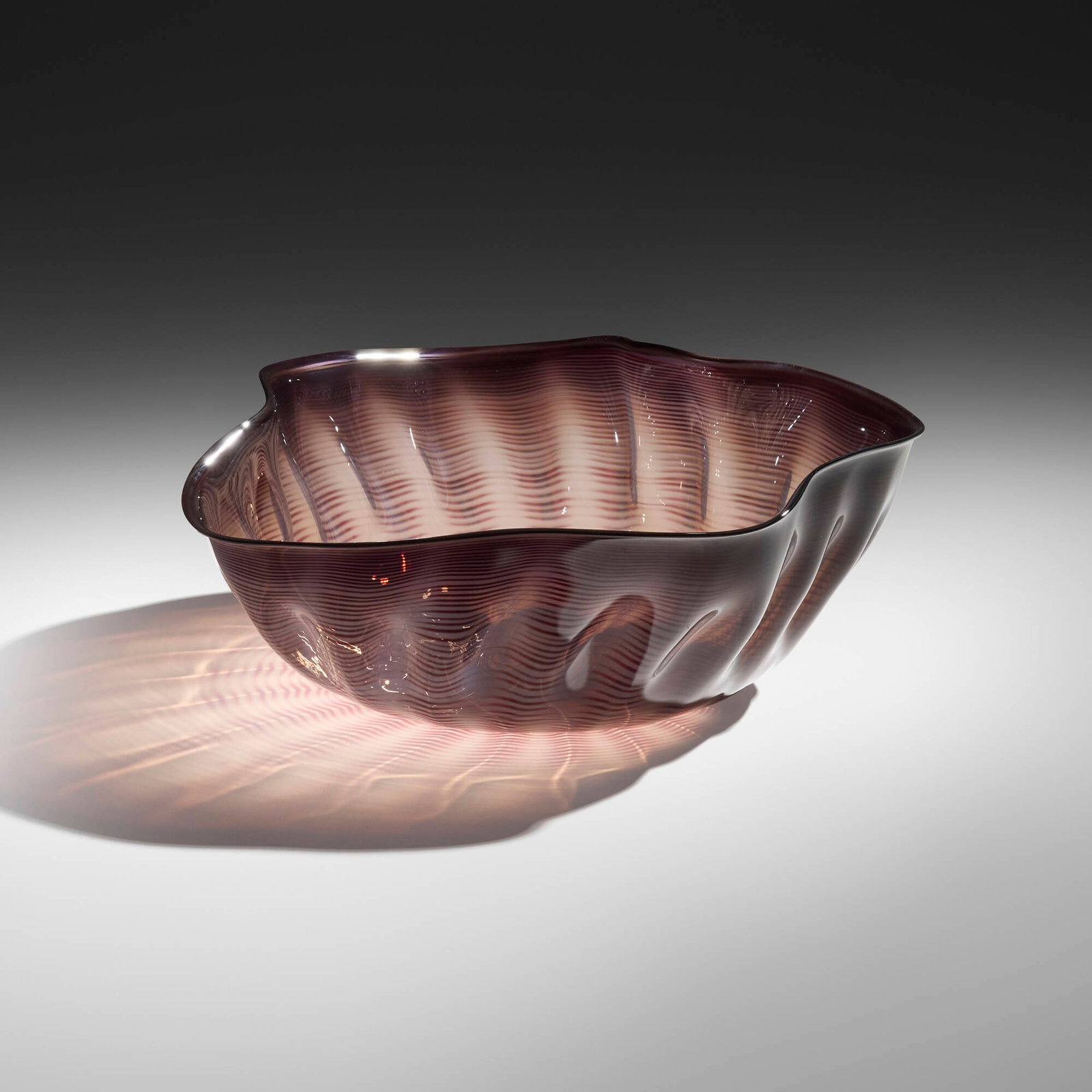 Dale Chihuly, Macchia: Dale Chihuly Macchia 1981 hand-blown glass 5.5 h x 14.5 w x 14 d in (14 x 37 x 36 cm) Work features a rare, deep purple color. Etched signature and date to underside 'Chihuly 1981'. This work