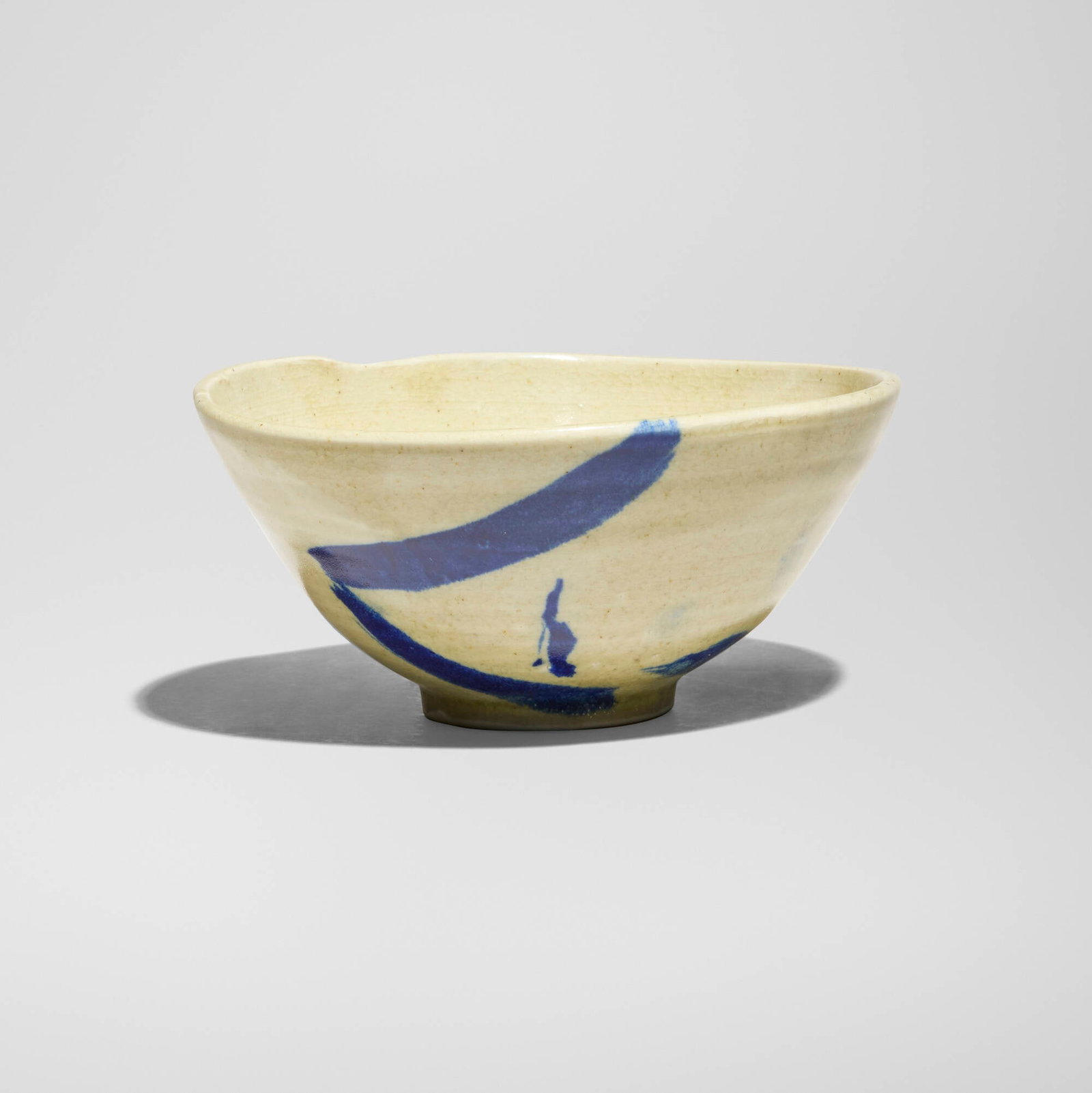 Toshiko Takaezu, Tea bowl: Toshiko Takaezu Tea bowl c. 1982 glazed porcelain 3 h x 6 w x 5.75 d in (8 x 15 x 15 cm) Incised signature to underside 'TT'. Provenance: Acquired directly from the artist, Collection of Pearl