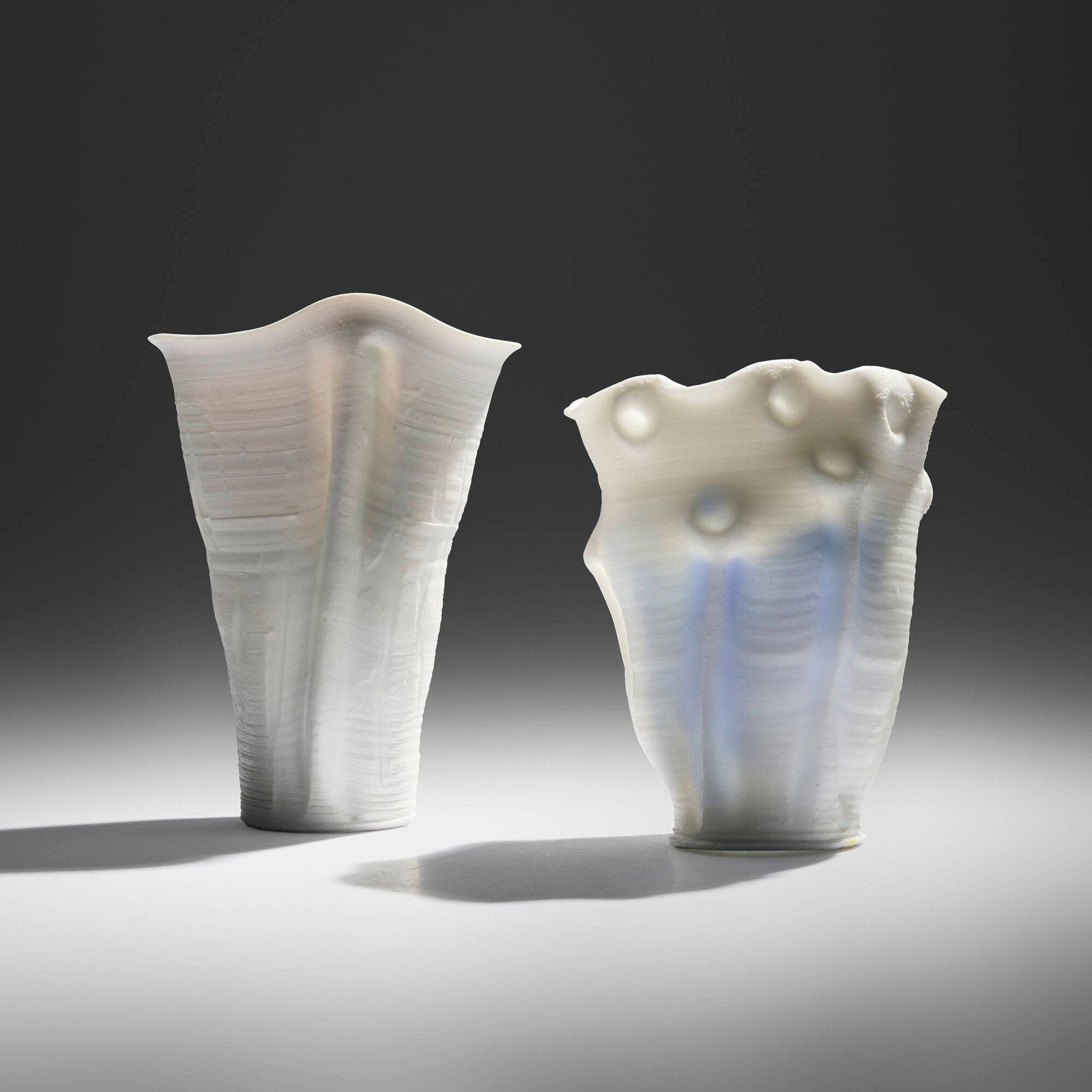 Rudolf Staffel, Light Gatherers, set of two: Rudolf Staffel Light Gatherers, set of two c. 1990glazed porcelain, porcelain 7.25 h x 5.125 w x 4 d in (18 x 13 x 10 cm) 6.375 h x 5 w x 4.875 d in (16 x 13 x 12 cm) Incised signature to u