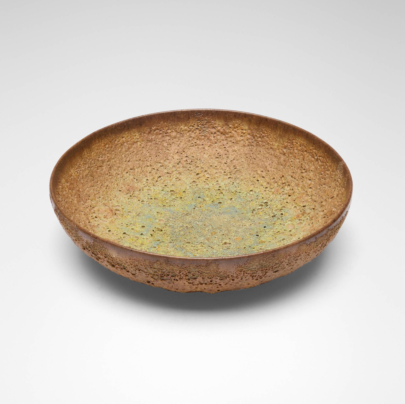 Gertrud and Otto Natzler, Bowl: Gertrud and Otto Natzler Bowl USAvolcanic-glazed earthenware 2.125 h x 7.875 dia in (5 x 20 cm) Signed to underside 'Natzler'. This work will ship from Lambertville, New Je