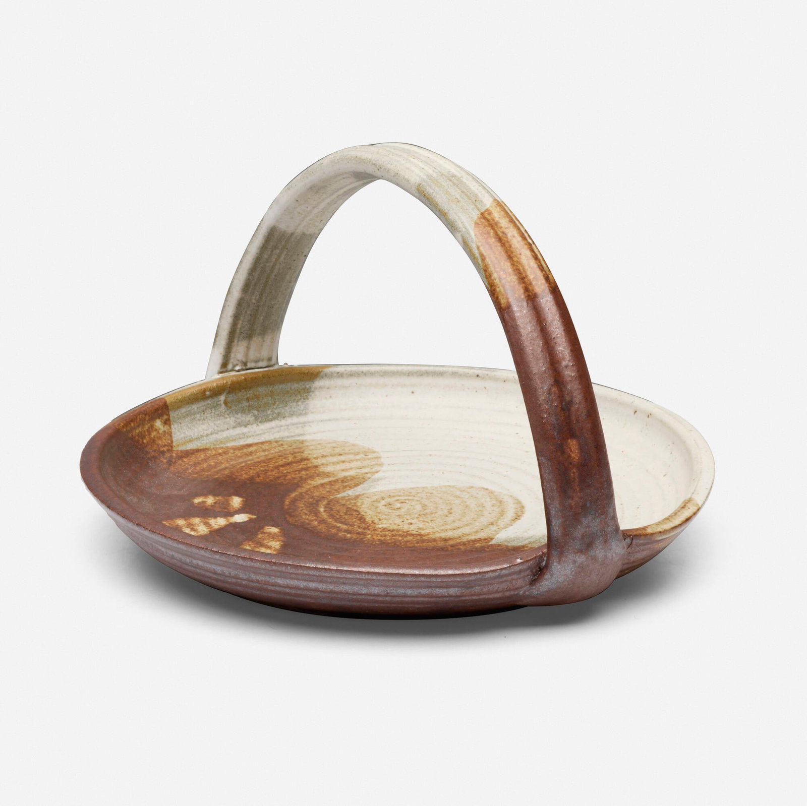 Charles Higa, Plate with handle: Charles Higa Plate with handle glazed stoneware 6 h x 9.75 w x 9.5 d in (15 x 25 x 24 cm) Incised signature to underside 'Higa'. Provenance: Acquired directly from the artist by the present