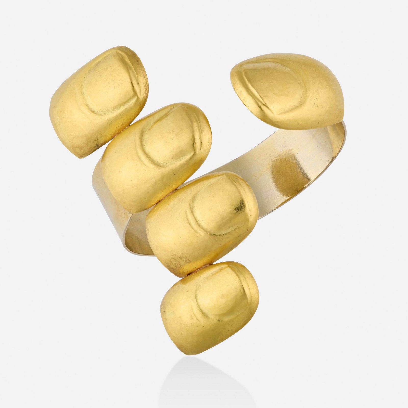 Bruno Martinazzi, 'Goldfinger' bicolor gold bracelet: Bruno Martinazzi 'Goldfinger' bicolor gold bracelet Designed as a curled left hand; this work is number 6 from the edition of 12 20k yellow gold, 18k white gold Signed Martinazzi Inner circ. 6.50