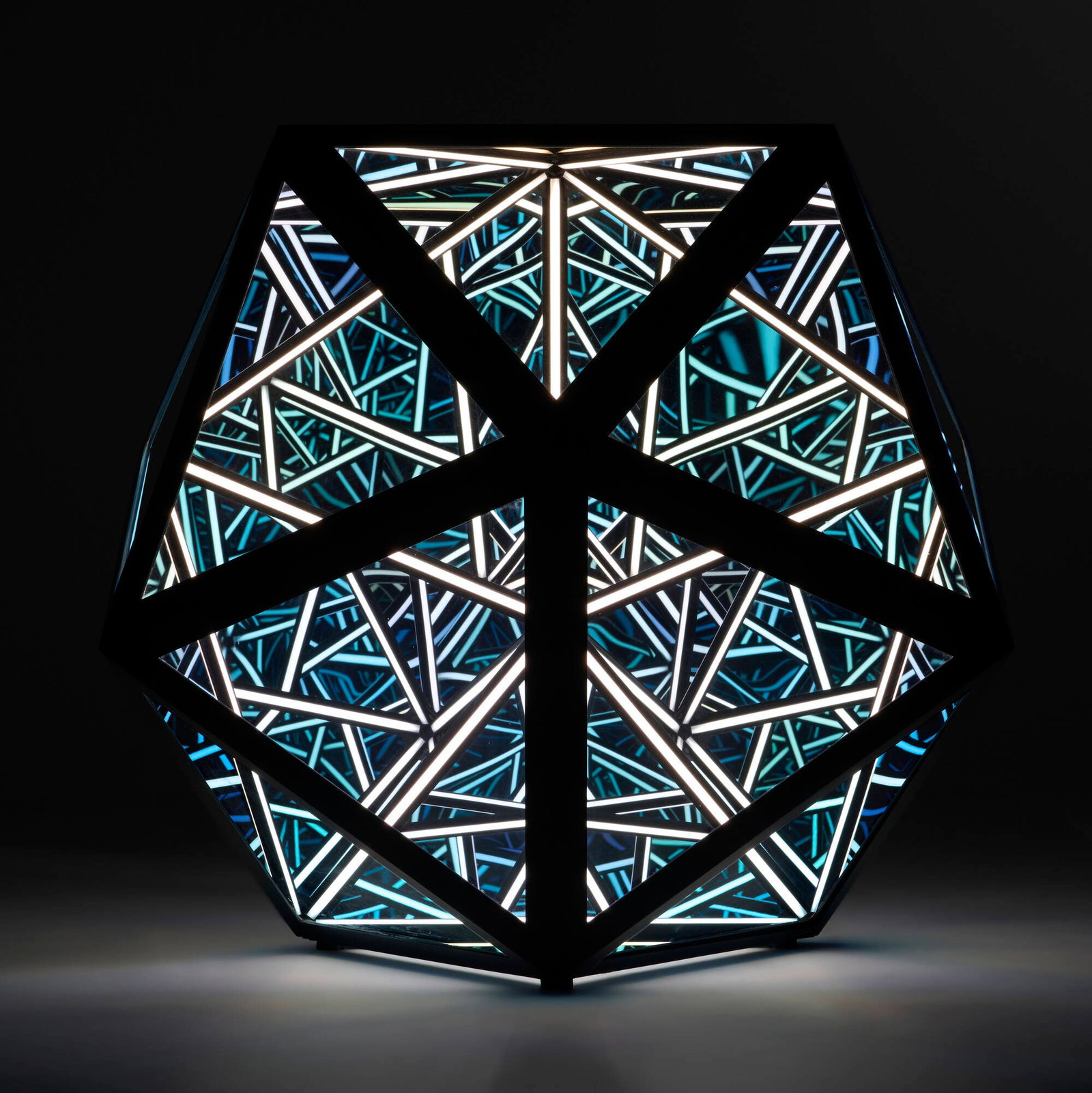 Anthony James, Icosahedron 40'': Anthony James Icosahedron 40'' 2019 powder-coated aluminum, LED lights, one-way glass 41 h x 48 w x 48 d in (104 x 122 x 122 cm) Provenance: Melissa Morgan Fine Art, Palm Deser