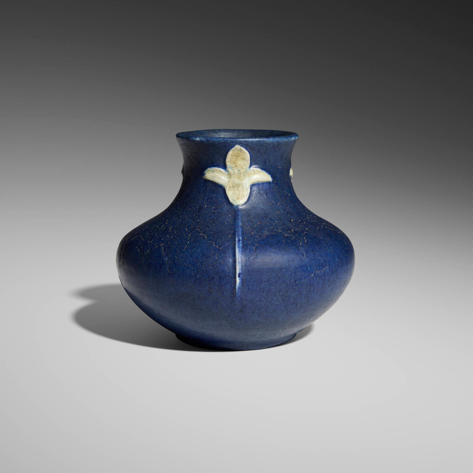 Eva Russell for Grueby Faience Company, Rare vase with blossoms: Eva Russell for Grueby Faience Company Rare vase with blossoms USA, 1899-1910 glazed earthenware 5 h x 5.5 dia in (13 x 14 cm) Impressed manufacturer's mark to underside 'Grueby Pottery Bo