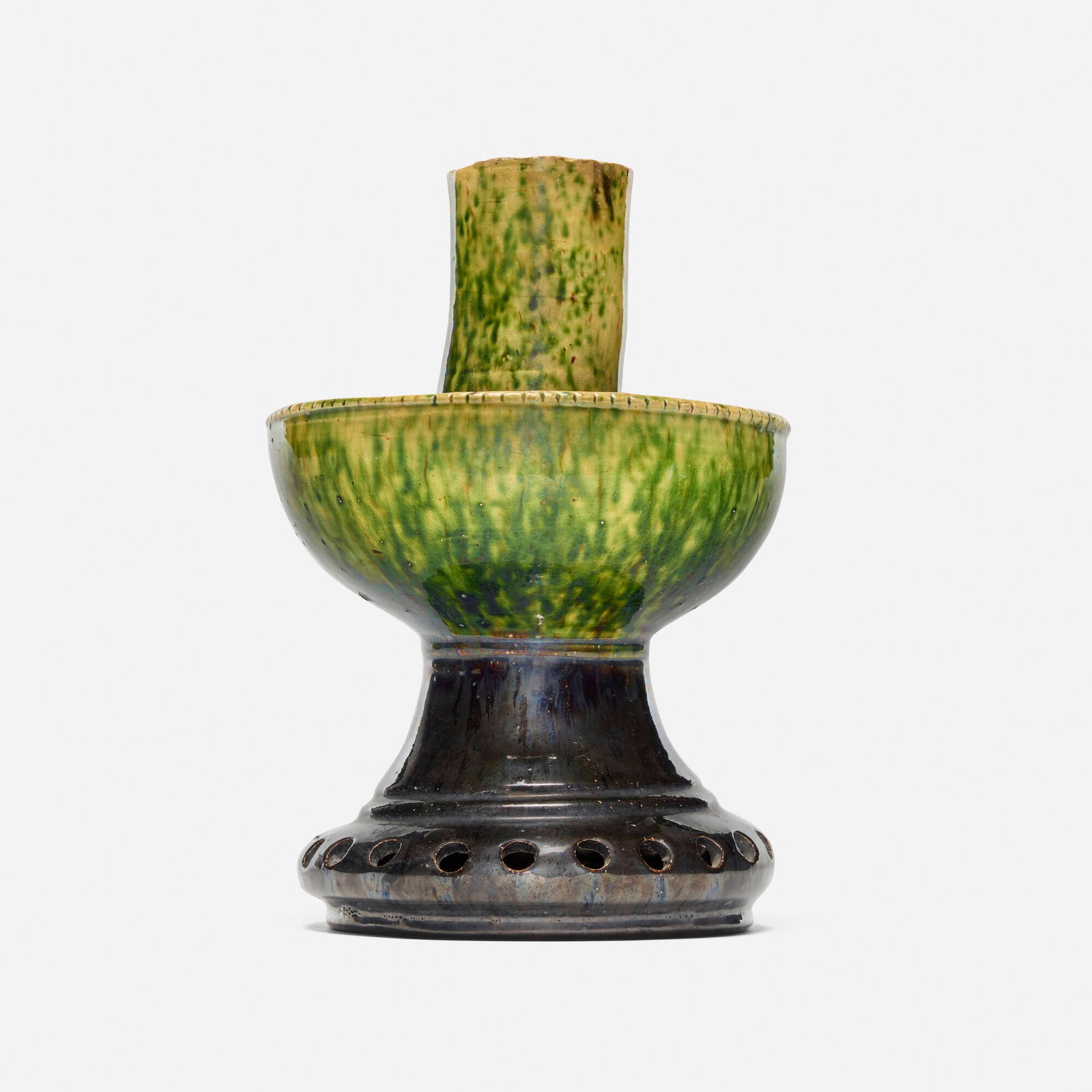 George E. Ohr, Large flower frog: George E. Ohr Large flower frog USA, 1897-1900 glazed earthenware 9 h x 6 dia in (23 x 15 cm) Flower frog features a mottled yellow and green glaze to top half and a gunmetal glaze to bottom half.
