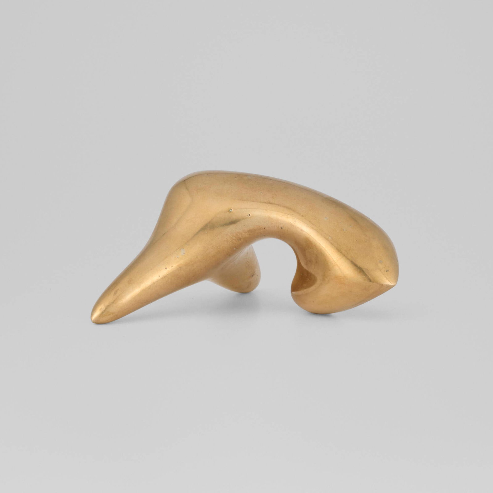 Jean (Hans) Arp, Man Seen by a Flower: Jean (Hans) Arp Man Seen by a Flower 1958 bronze 2.25 h x 4.25 w x 4.625 d in (6 x 11 x 12 cm) This work is from the edition of 400 given by the Belgian government to contributors to the 1958 U