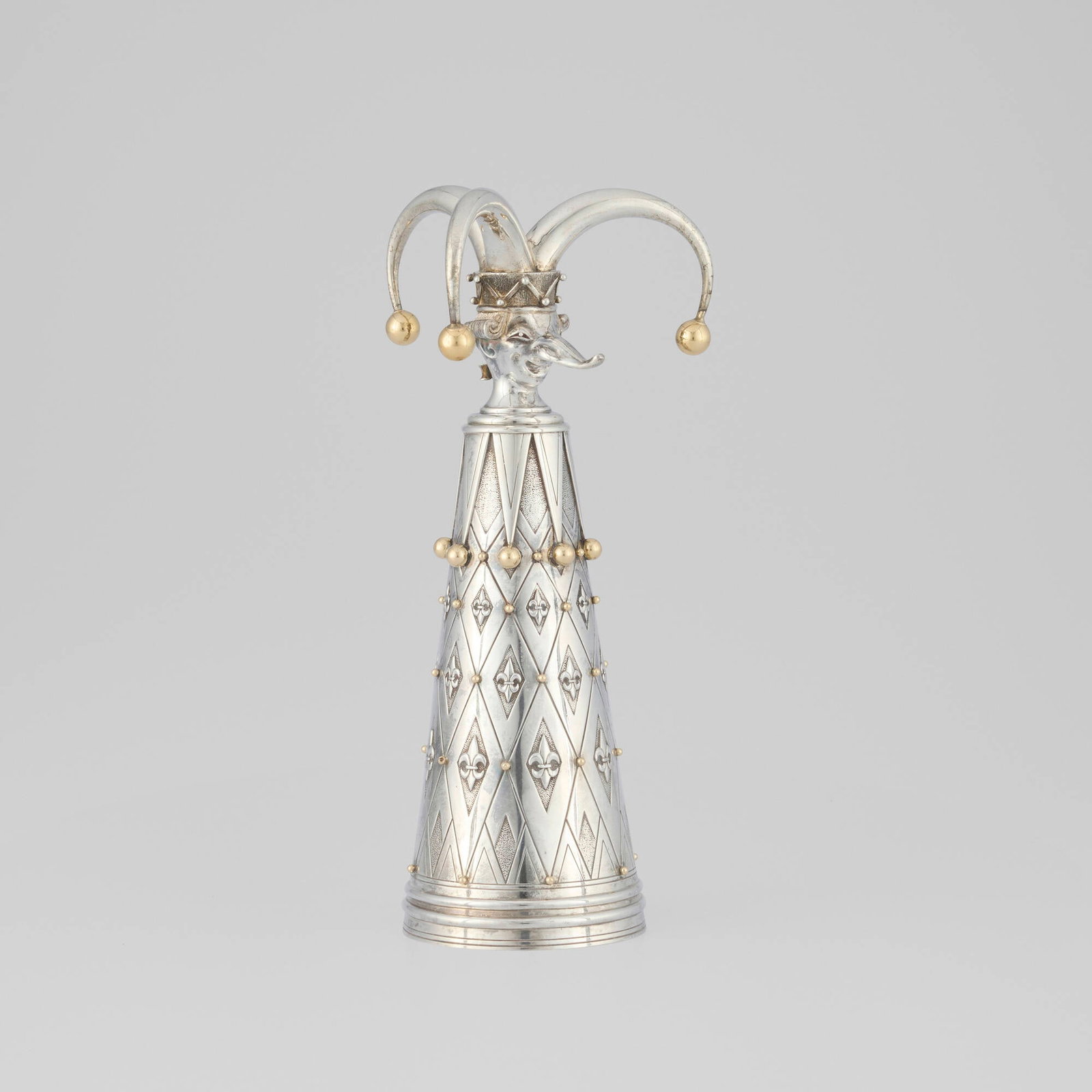 Mihail Chemiakin, Petrushka: Mihail Chemiakin Petrushka sterling silver parcel-gilt 10.25 h x 5 dia in (26 x 13 cm) Impressed manufacturer's mark to outer rim '585 Sterling' with hallmark. This work will ship from