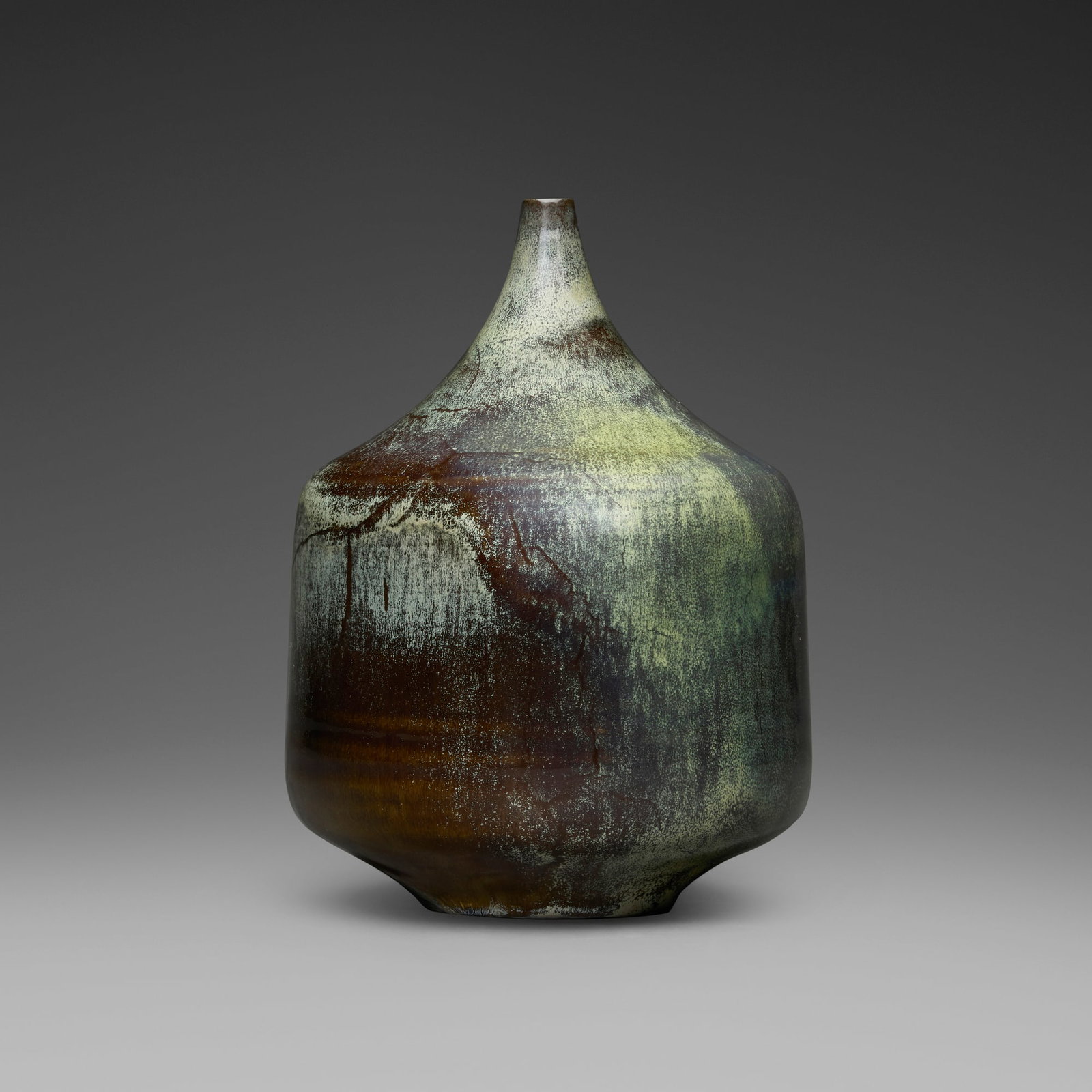 Gertrud and Otto Natzler, Cylindrical bottle form: Gertrud and Otto Natzler Cylindrical bottle form 1968 earthenware with Cat's Eye Reduction Fired glaze with melt fissures 7.625 h x 5.625 dia in (19 x 14 cm) Signed to underside 'Natzler' with