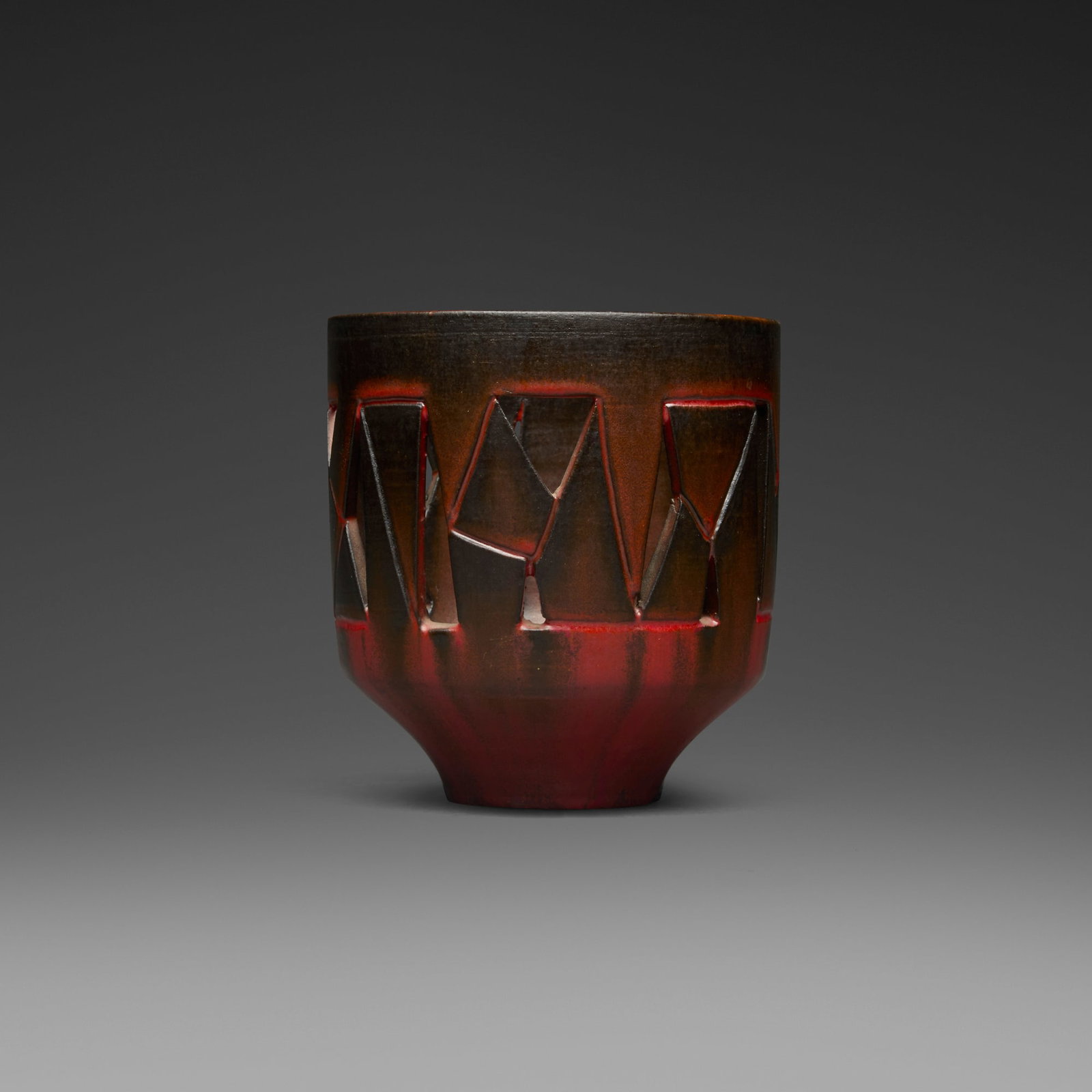 Gertrud and Otto Natzler, Cylindrical yahrzeit lamp: Gertrud and Otto Natzler Cylindrical yahrzeit lamp 1964 earthenware with Red glaze 4.25 h x 4 dia in (11 x 10 cm) Signed to underside 'Natzler' with archive number 'N232'. This work is