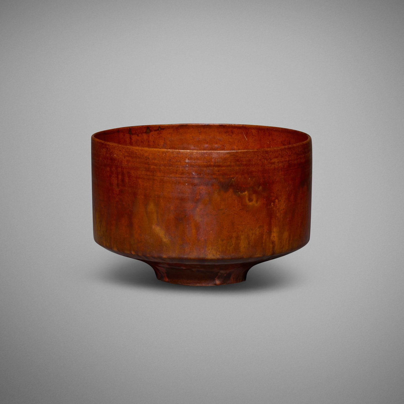 Gertrud and Otto Natzler, Cylindrical bowl with fingermarks: Gertrud and Otto Natzler Cylindrical bowl with fingermarks 1963 earthenware with Burnt Orange glaze 4.125 h x 6.25 dia in (10 x 16 cm) Signed to underside 'Natzler' with archive number