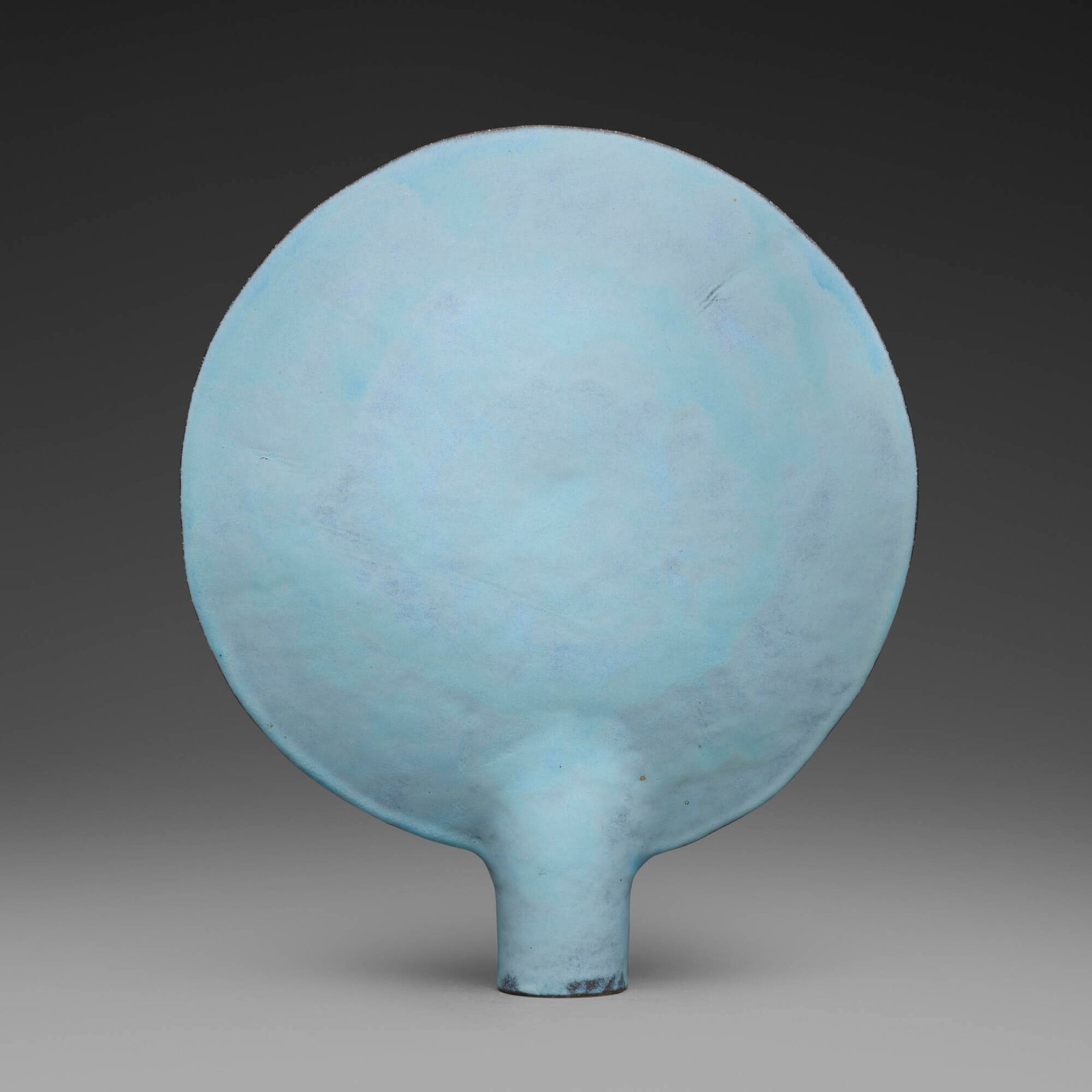 Otto Natzler, Circular disk on cylindrical base: Otto Natzler Circular disk on cylindrical base earthenware Pale Blue glaze 15 h x 13 w x 2.25 d in (38 x 33 x 6 cm) Impressed seal to interior 'ON' and incised number 'XIII' with