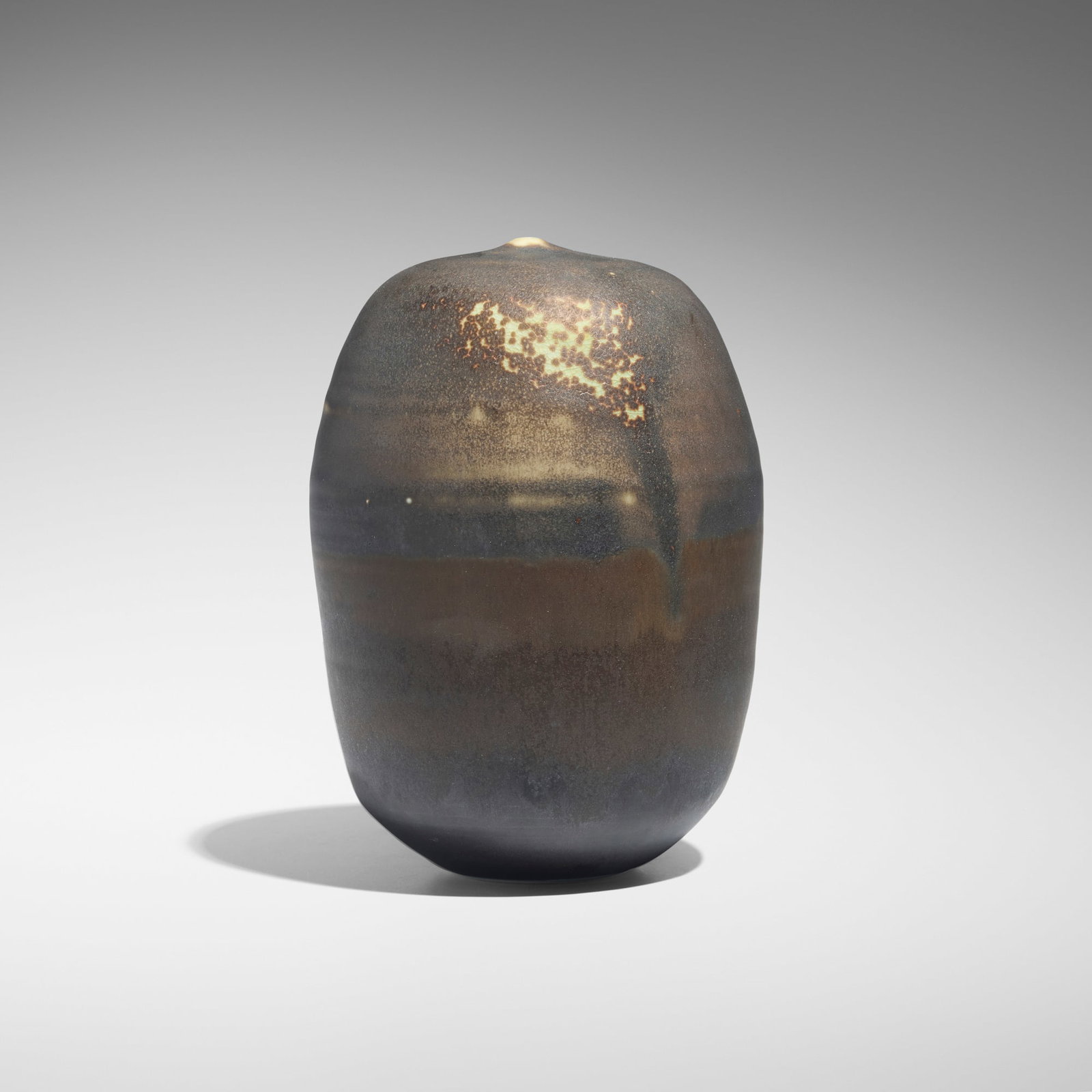 Toshiko Takaezu, Closed Form: Toshiko Takaezu Closed Form c. 1993 glazed porcelain 6.75 h x 4.875 dia in (17 x 12 cm) Incised signature to underside 'TT'. Provenance: Acquired directly from the artist in Hawaii, Private