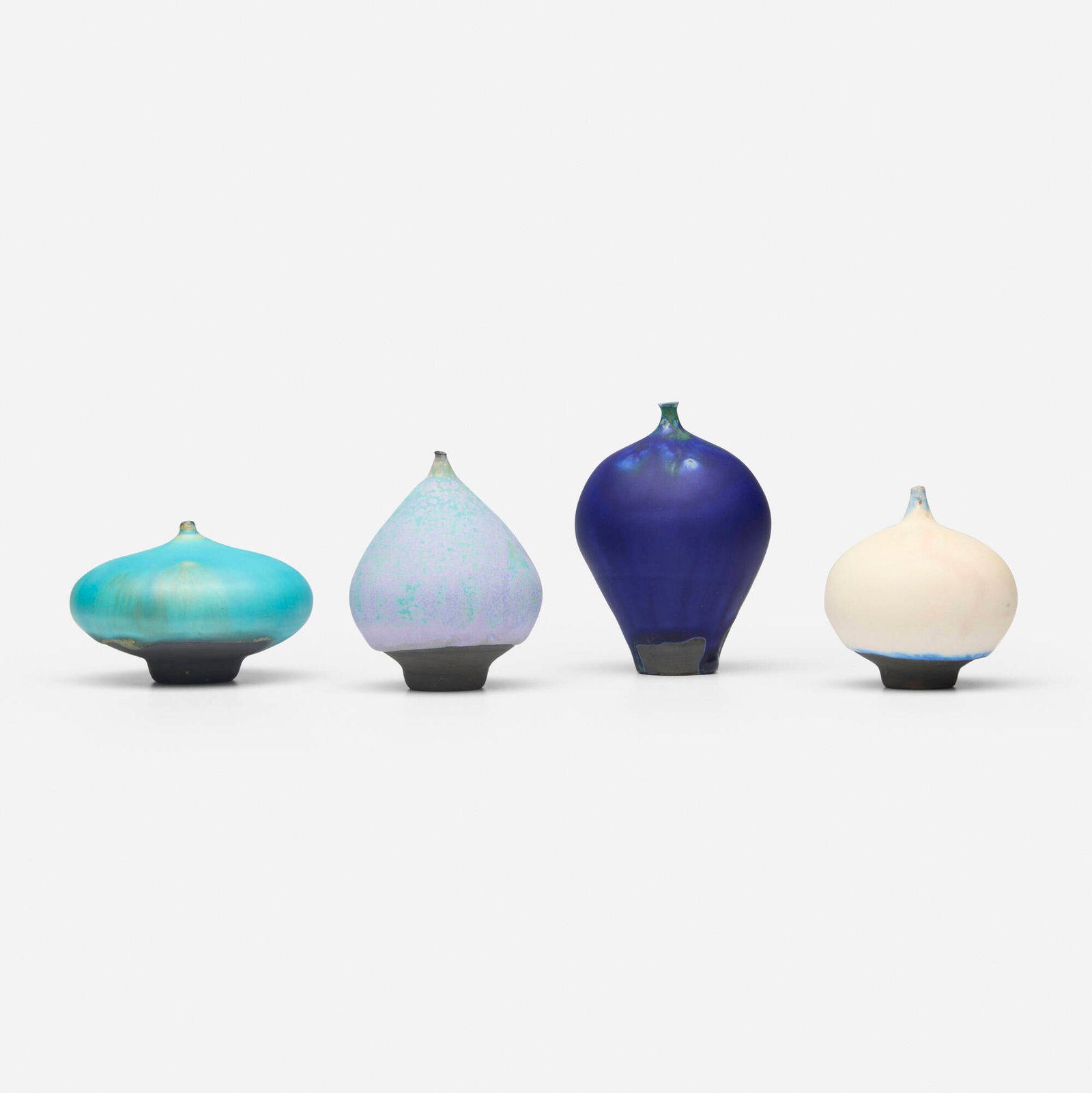 Rose and Erni Cabat, Collection of four Feelies: Rose and Erni Cabat Collection of four Feelies 1970-1990 glazed porcelain tallest: 4 h x 2.75 dia in (10 x 7 cm) shortest: 2.5 h x 3.5 dia in (6 x 9 cm) Incised signature to underside of each example