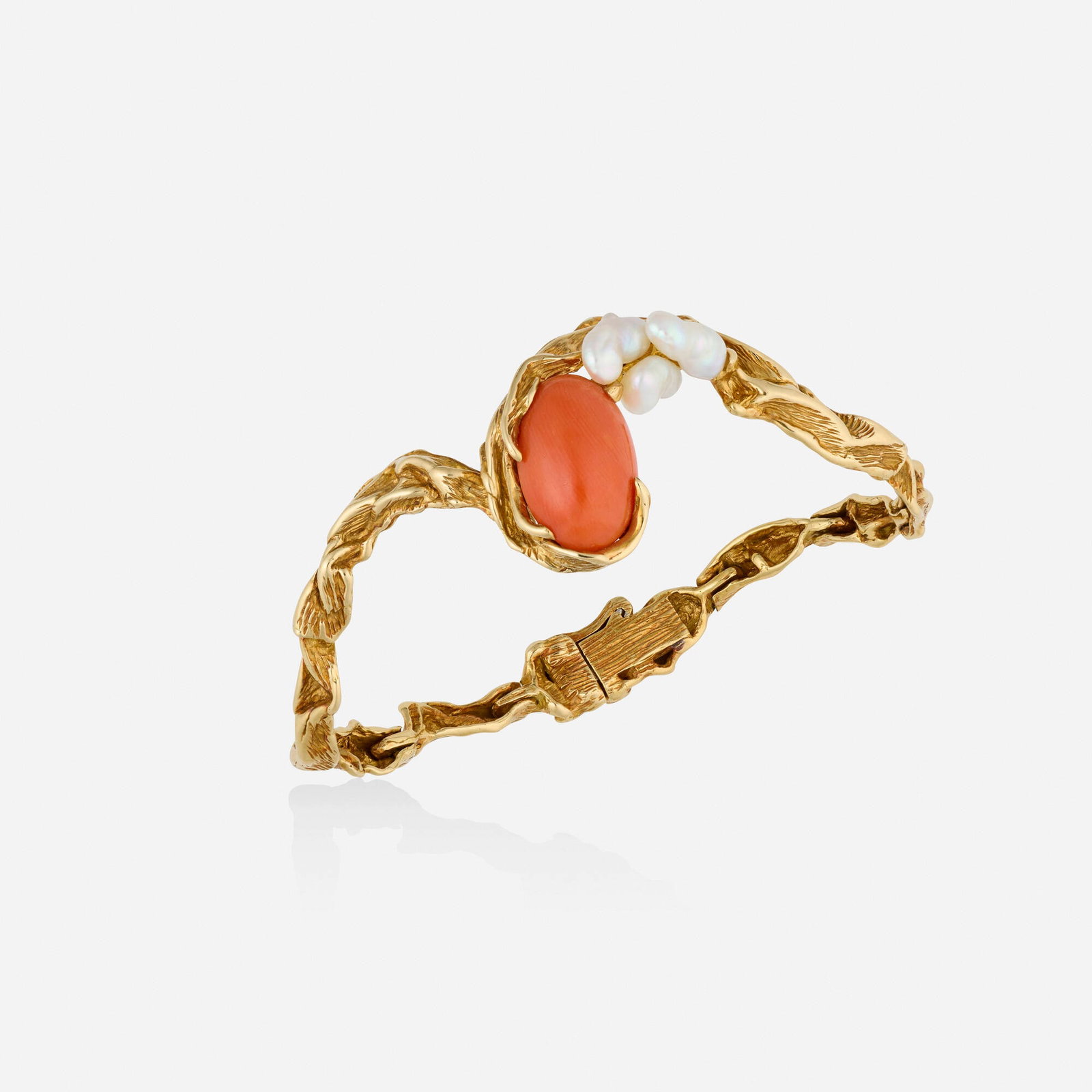 Gilbert Albert, Coral, baroque freshwater pearl, and gold bracelet: Gilbert Albert Coral, baroque freshwater pearl, and gold bracelet Lori Ulanova was one of the first female violinists in the Los Angeles Philharmonic Of freeform gold, set with a cabochon coral and