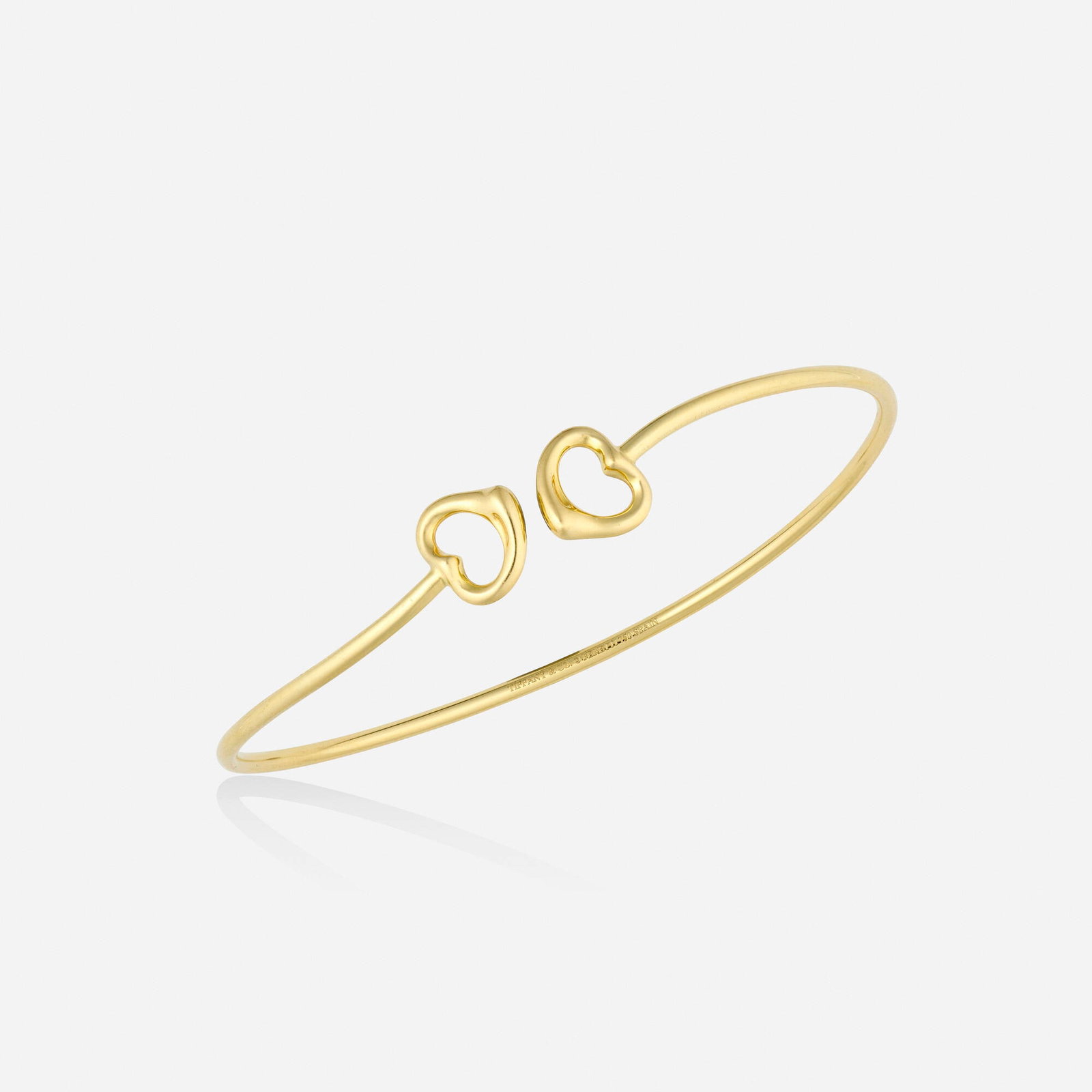Elsa Peretti for Tiffany & Co., 'Double Open Heart' gold bracelet (1 of 3)