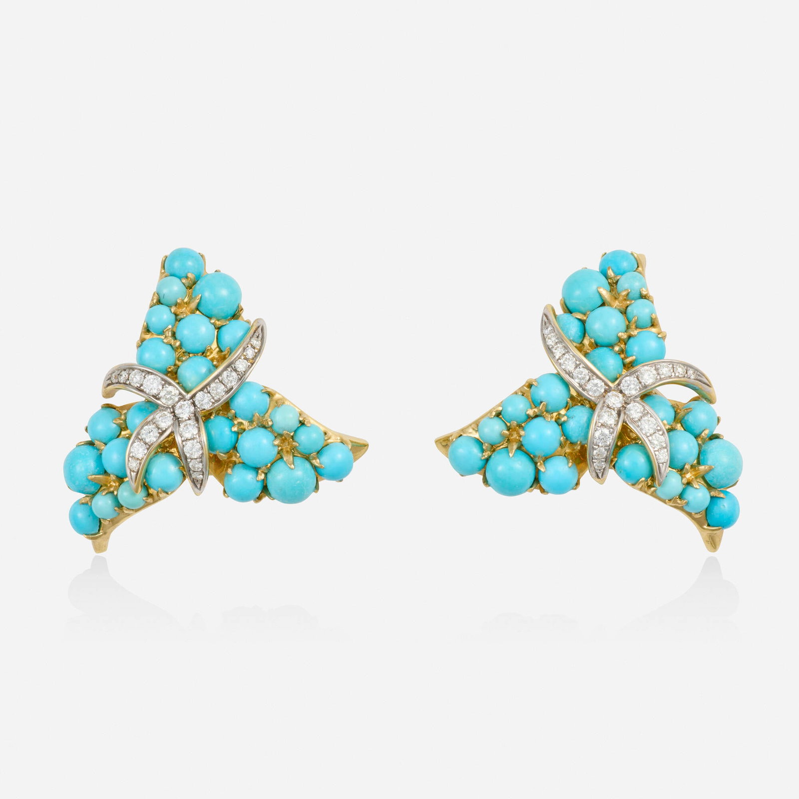 Turquoise, diamond, and gold earrings: Turquoise, diamond, and gold earrings Each a spray set with cabochon turquoise and round brilliant-cut diamonds 18k yellow and white gold 1.25 x 1.25 in; Gross weight 15.6 dwts This work will ship fro
