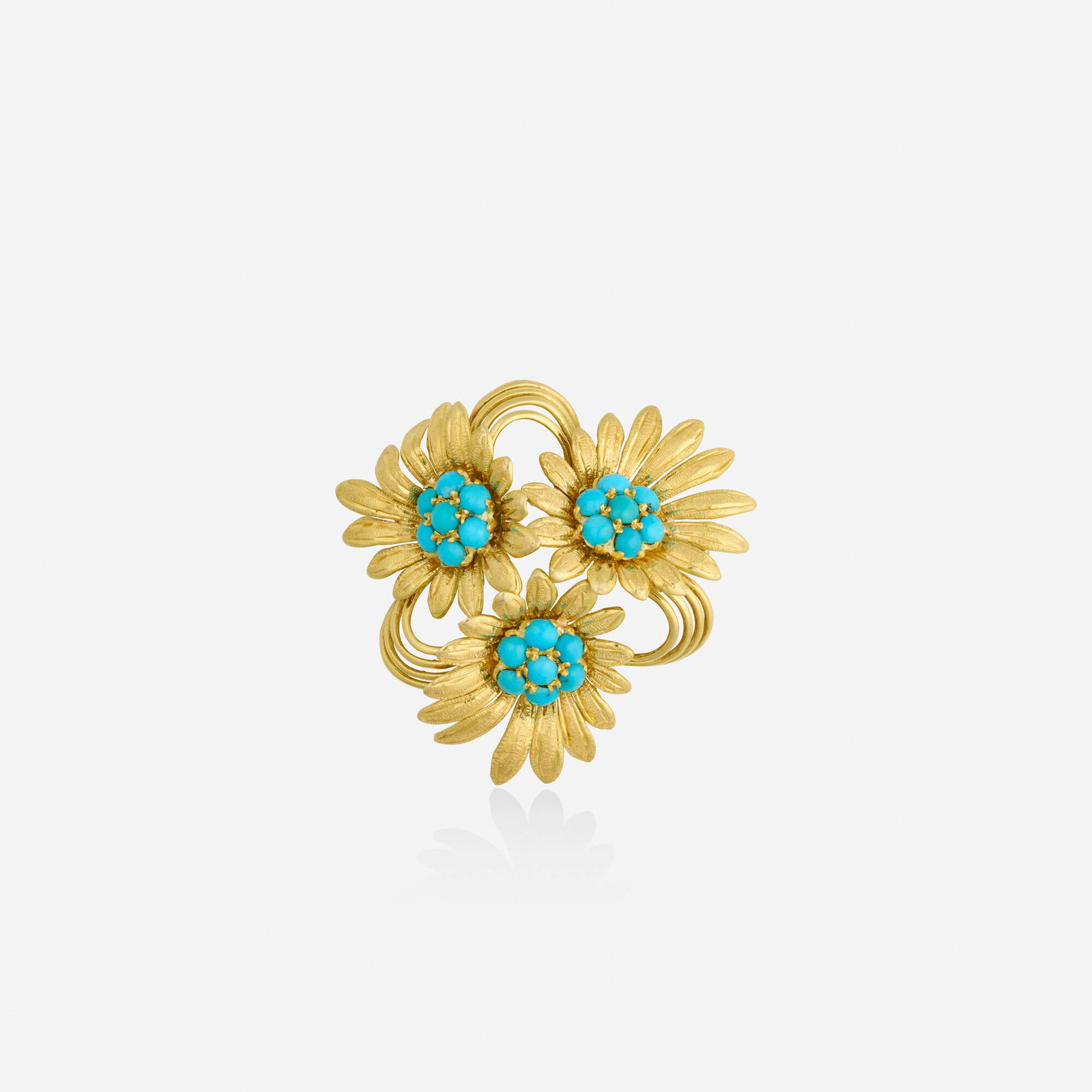 Italian, Turquoise and gold brooch: Italian Turquoise and gold brooch Designed with three daisies set with cabochon turquoise 18k yellow gold 1.625 x 1.625 in; Gross weight 11.4 dwts This work will ship from Lambertville, New Jersey.