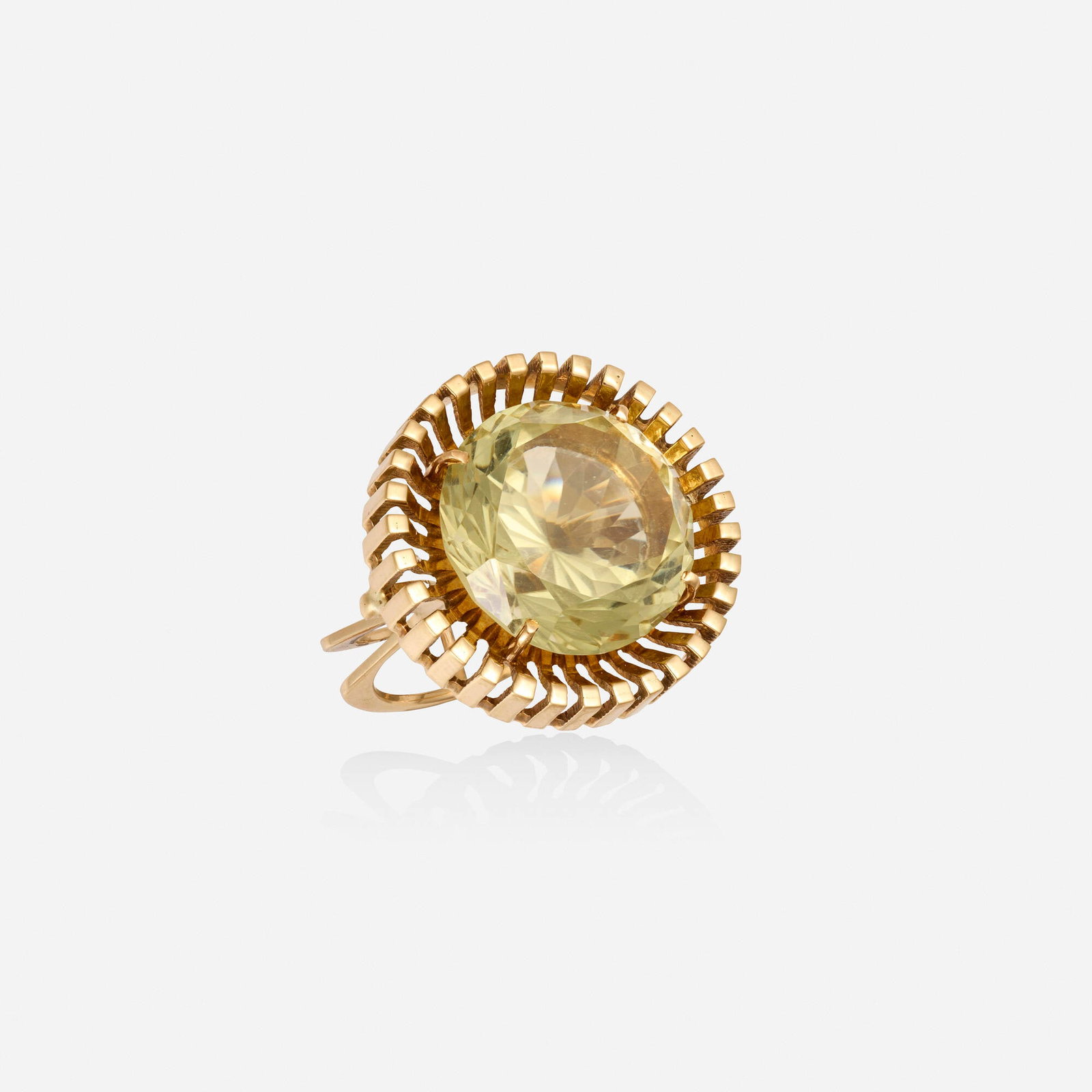 Yellow quartz and gold ring: Yellow quartz and gold ring Set with a circular-cut yellow quartz 14k yellow gold Ring size 7.50-7.75; Gross weight 8.7 dwts This work will ship from Lambertville, New Jersey.