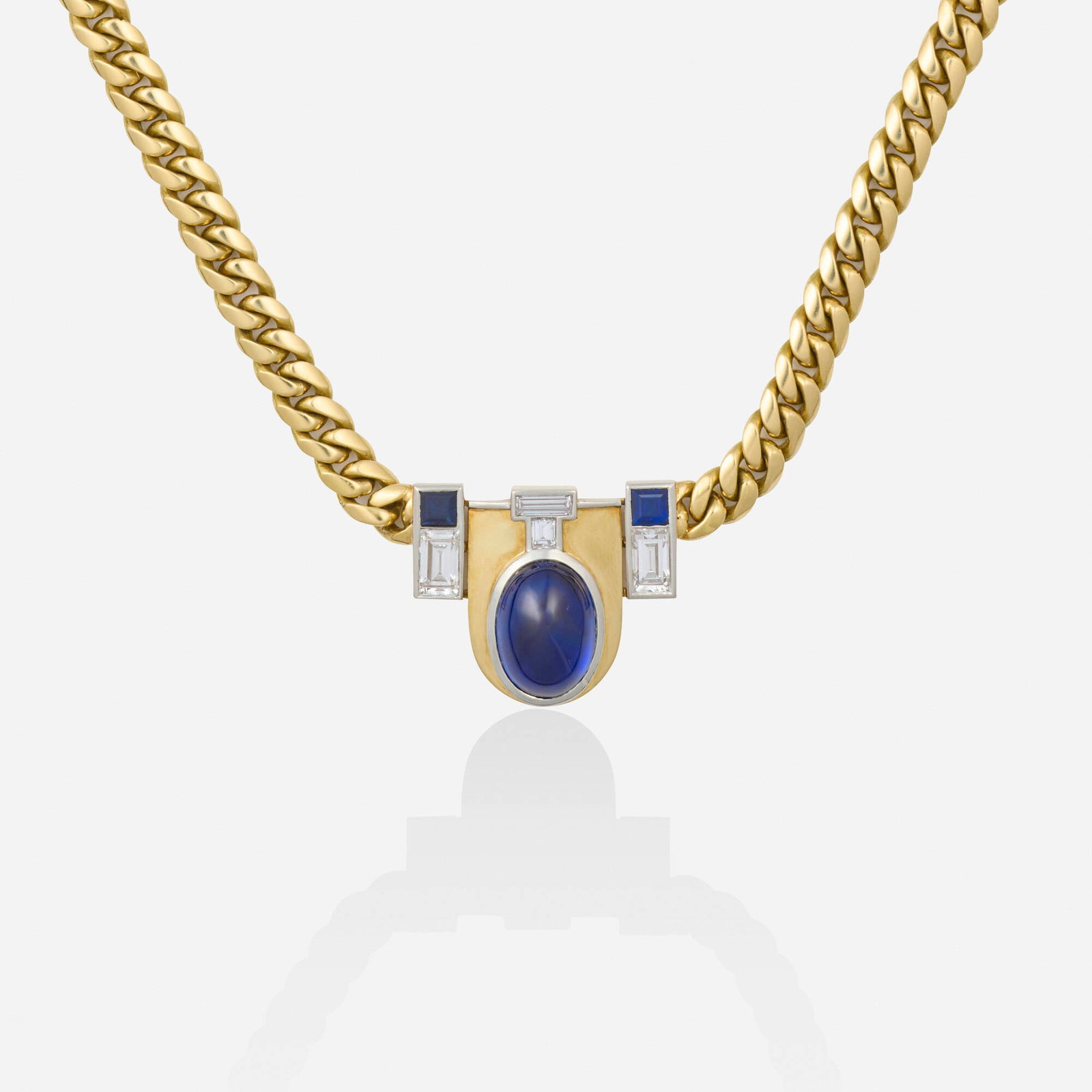 Sapphire, diamond, and gold necklace: Sapphire, diamond, and gold necklace The pendant set with a cabochon sapphire, baguette-cut diamonds, and square-cut sapphires, joined by the curb link chain 18k yellow gold, platinum Necklace 15.75