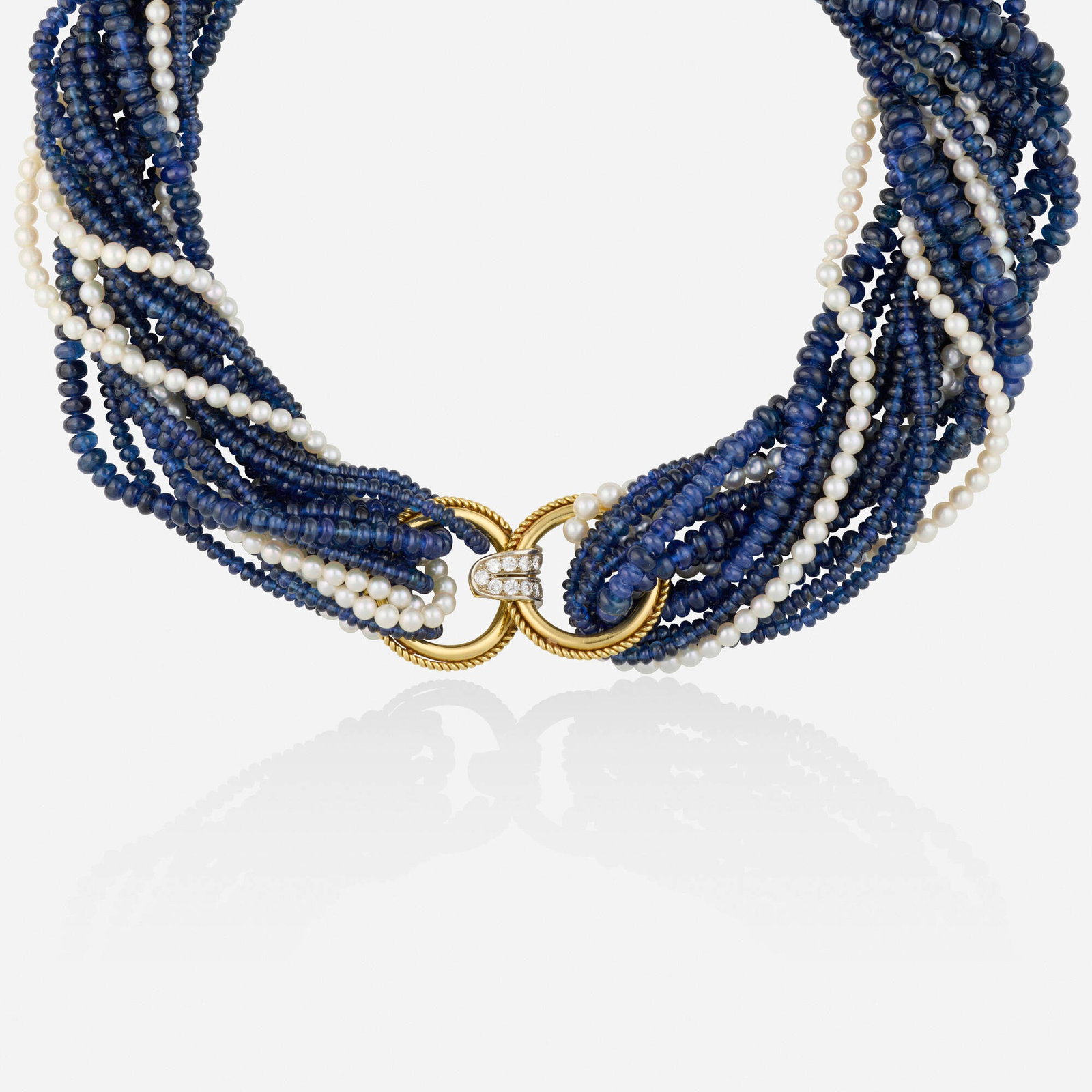 Sapphire, cultured pearl, and diamond necklace: Sapphire, cultured pearl, and diamond necklace Designed with four stands of sapphires and two strands of cultured pearls, joined by a roped gold clasp enhanced with round brilliant-cut diamonds