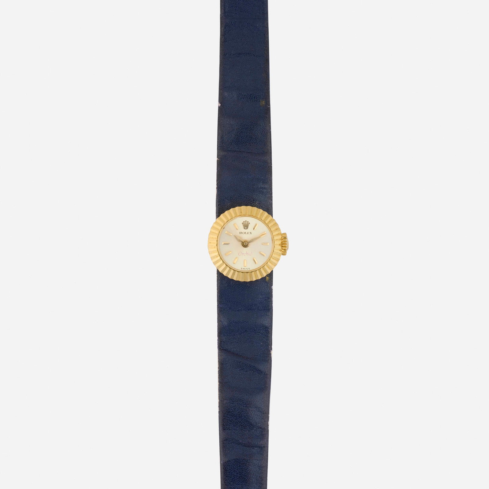 Rolex, 'Orchid' gold wristwatch: Rolex 'Orchid' gold wristwatch With baton hours Dial: Silvered Movement: Manual wind Case Material: 18k yellow gold Case Size: 16 mm Buckle/Strap: Blue leather, 7 in Clasp/Buckle: Pin buckle This