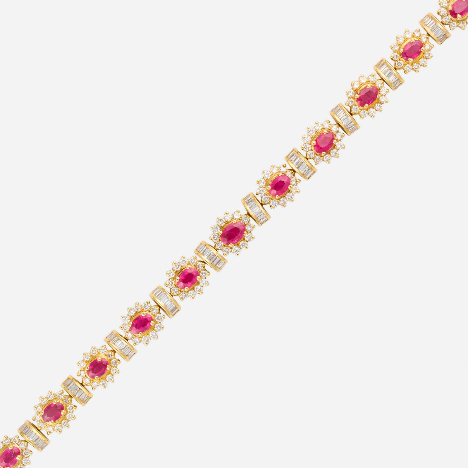 Ruby, diamond, and gold bracelet: Ruby, diamond, and gold bracelet Set with oval-cut rubies, round brilliant and baguette-cut diamonds Yellow gold 6.625 x 0.375 in; Gross weight 17.2 dwts This work will ship from Lambertville, New