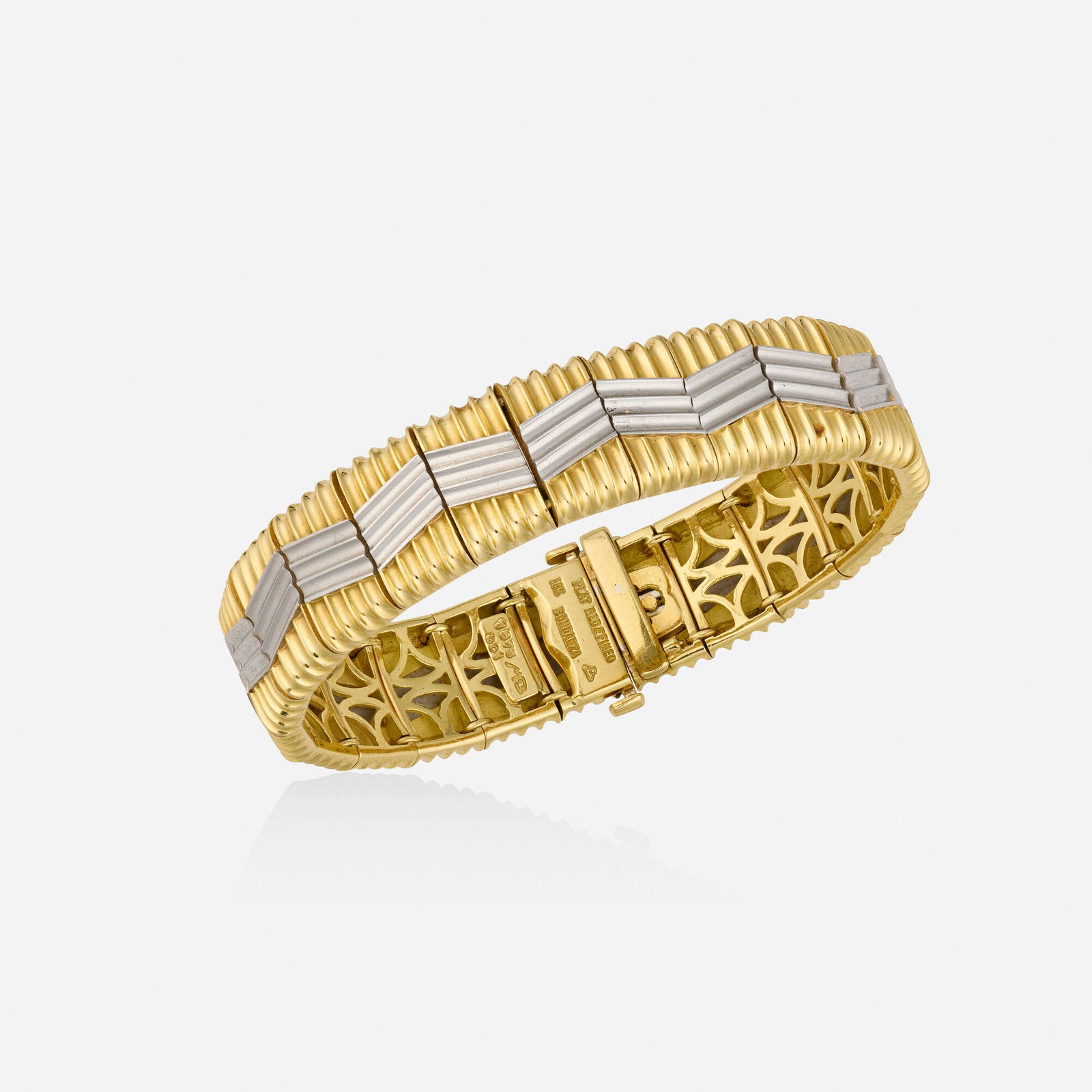 Michael Bondanza, 'Heatwave' gold and platinum bracelet: Michael Bondanza 'Heatwave' gold and platinum bracelet Of 'wave' design; 1990s 18k yellow gold, platinum Signed Bondanza, numbered Inner circ. 6.25 in, width 0.50 in; Gross weight 45.2 dwts