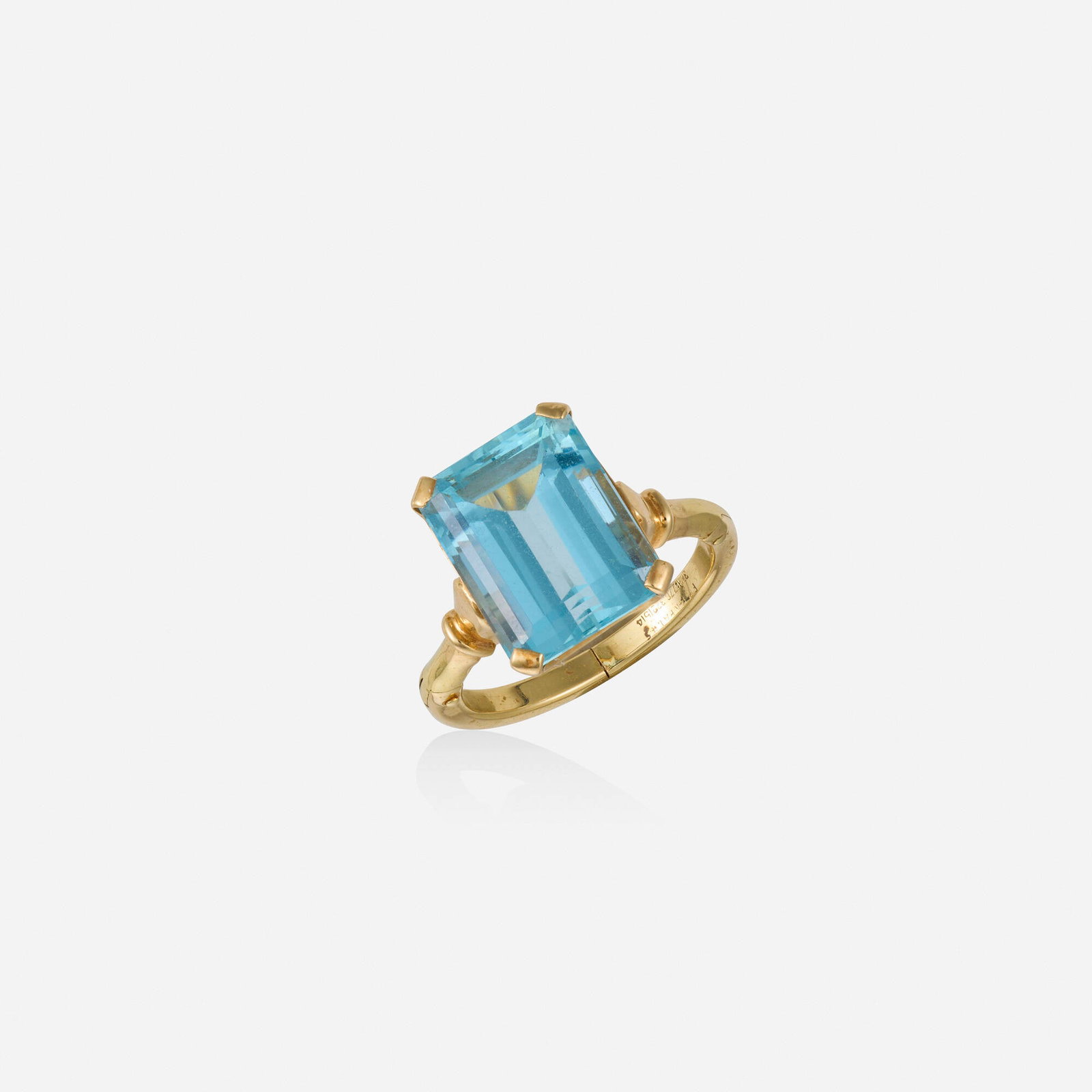 Aquamarine and gold ring: Aquamarine and gold ring Set with an emerald-cut aquamarine 14k yellow gold Ring size 8.50-10; Gross weight 4.1 dwts This work will ship from Lambertville, New Jersey.