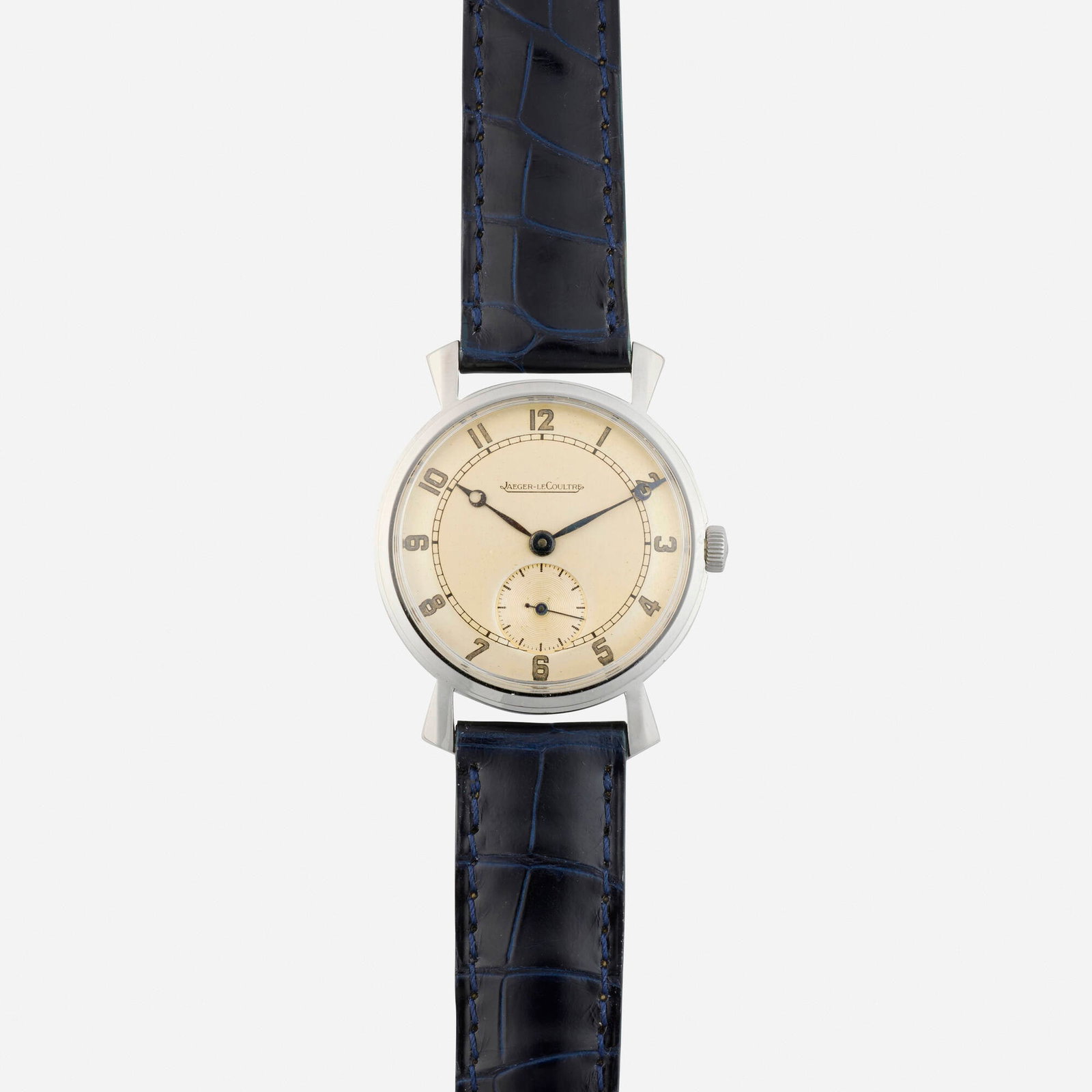 Jaeger-LeCoultre, Stainless steel wristwatch: Jaeger-LeCoultre Stainless steel wristwatch With Arabic hours and seconds sub-dial Dial: Silvered Movement: Manual wind Case Material: Stainless steel Case Size: 32 mm Buckle/Strap: Navy leather,