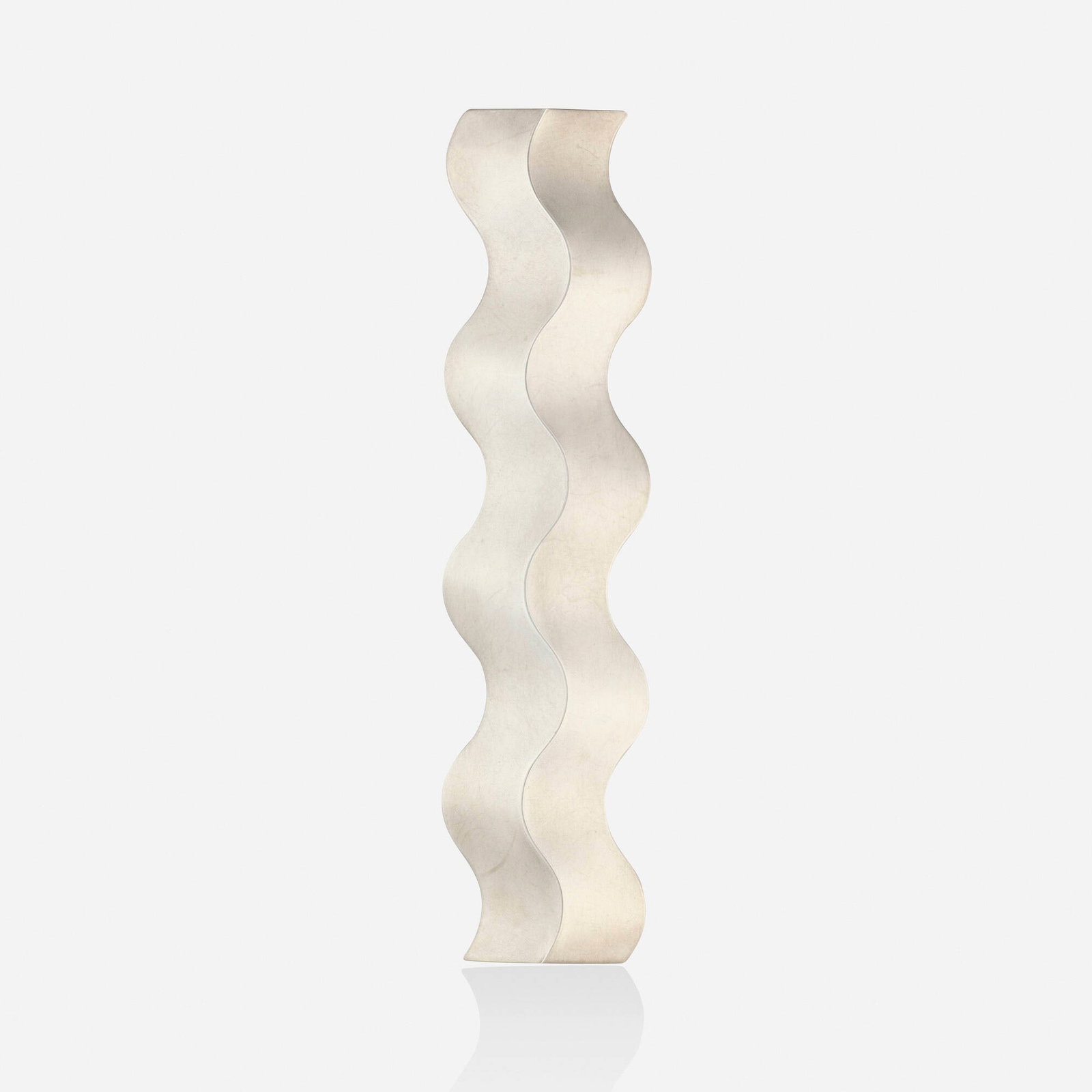 Niessing, 'Squiggle' platinum brooch: Niessing 'Squiggle' platinum brooch Of undulating design Platinum Signed with maker's mark for Niessing 4.25 x 1 in; Gross weight 10.2 dwts This work will ship from Lambertville, New Jersey.