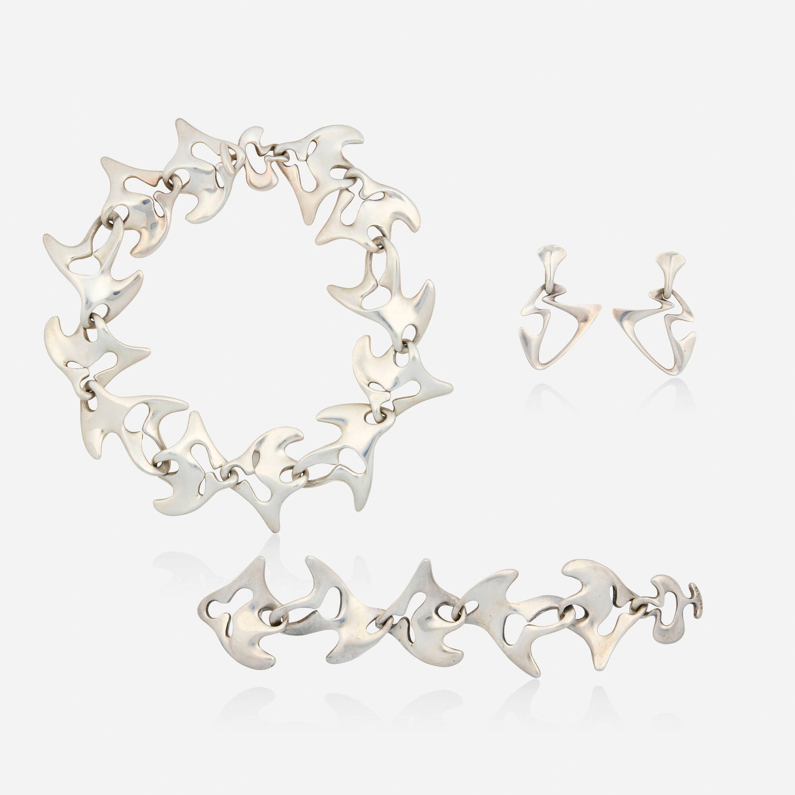 Henning Koppel for Georg Jensen, Group of 'Amoeba' sterling silver jewelry: Henning Koppel for Georg Jensen Group of 'Amoeba' sterling silver jewelry Denmark Lori Ulanova was one of the first female violinists in the Los Angeles Philharmonic Each of open-form design, nos. 89