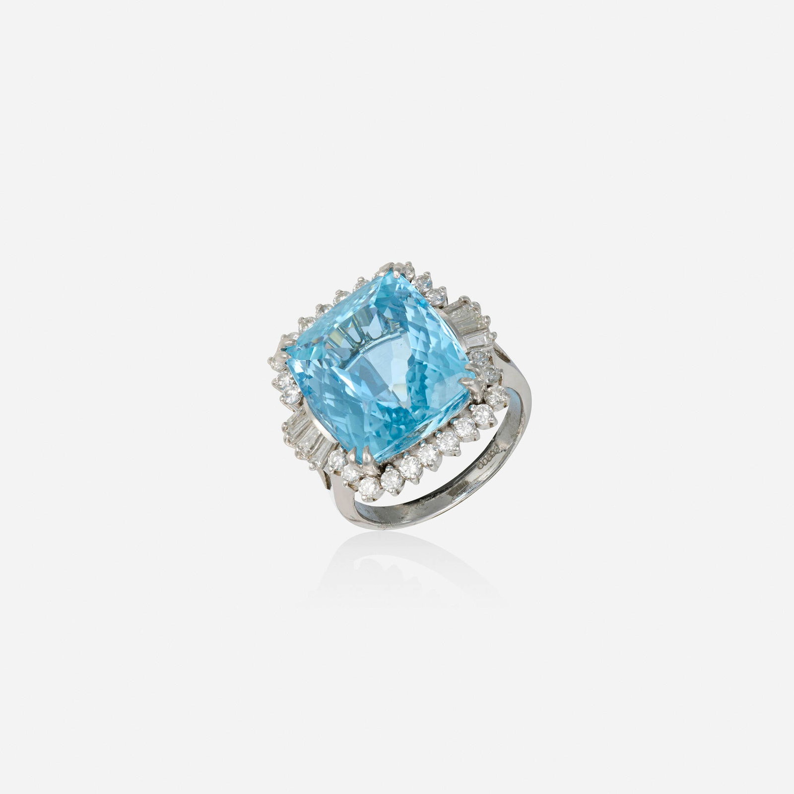 Aquamarine, diamond, and platinum ring: Aquamarine, diamond, and platinum ring Lori Ulanova was one of the first female violinists in the Los Angeles Philharmonic Set with a cushion-cut aquamarine framed by round brilliant-cut and tapered