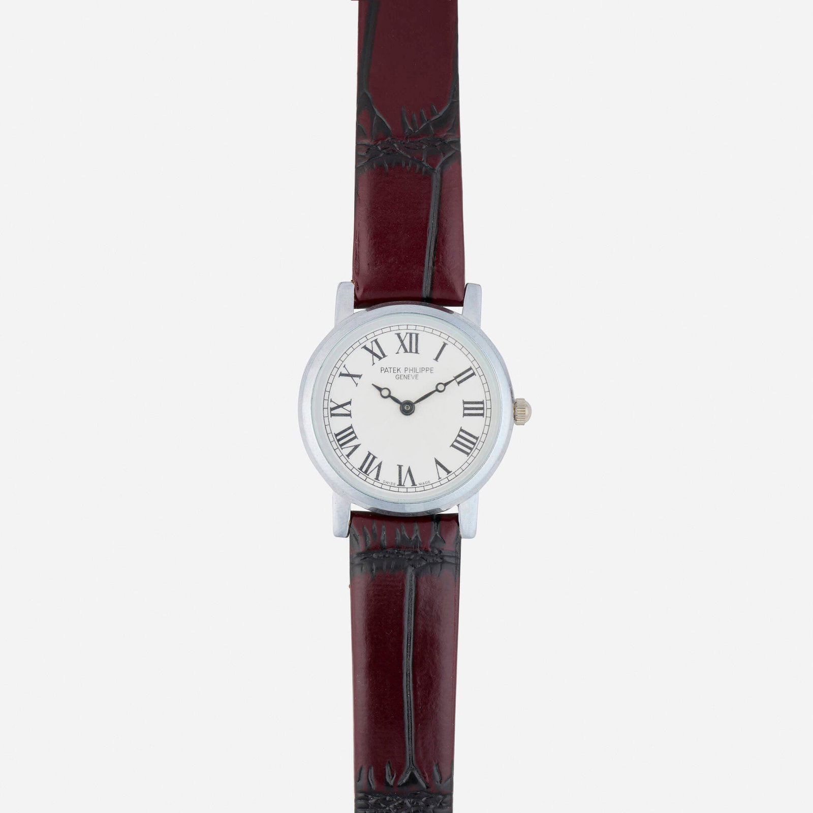 Patek Philippe, Stainless steel wristwatch: Patek Philippe Stainless steel wristwatch With Roman numeral hours Dial: Silvered Movement: Quartz Case Material: Stainless steel Case Size: 28 mm Buckle/Strap: Brown leather, 7 in Clasp/Buckle: Pin