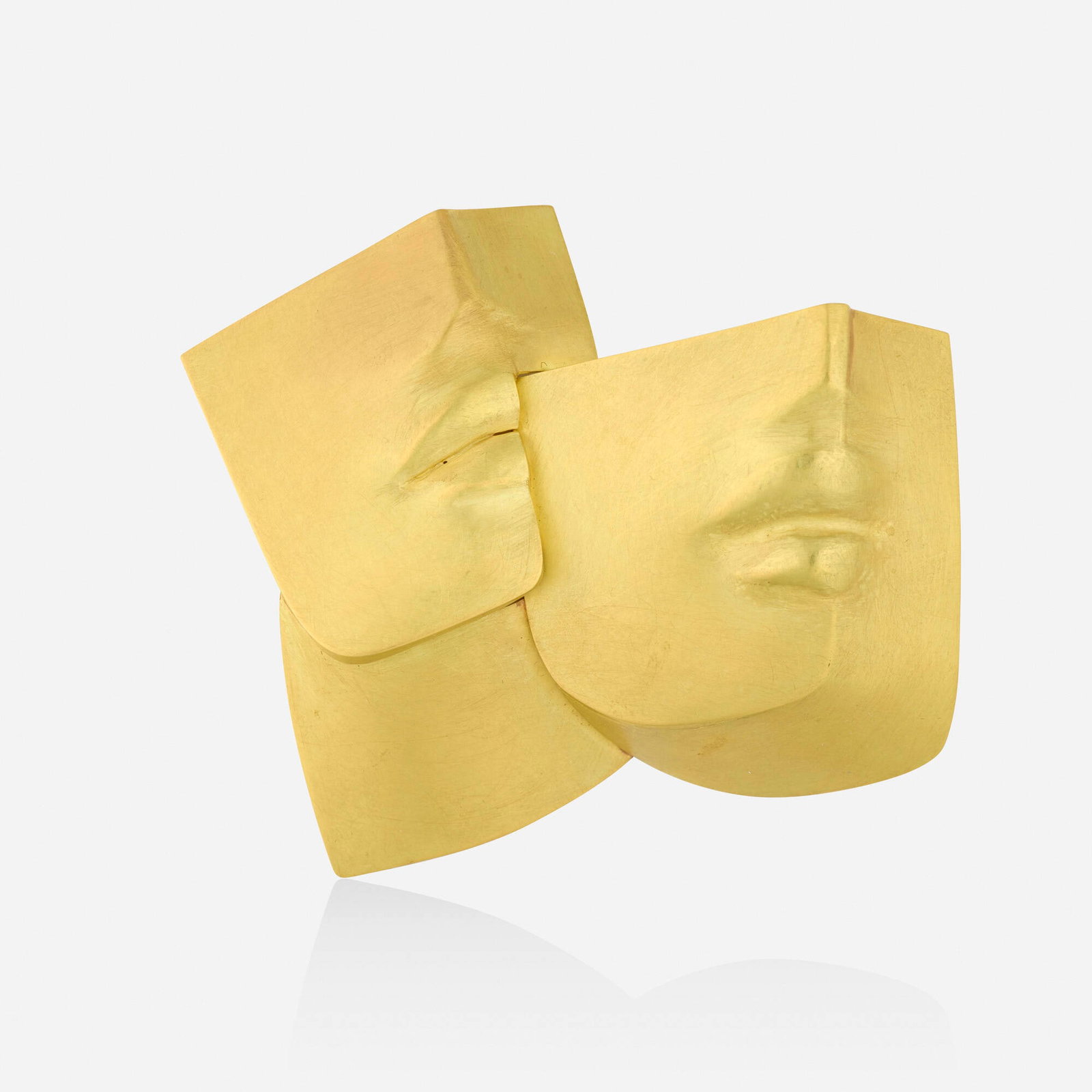 Bruno Martinazzi, attribution, 'Oedipus' gold brooch: Bruno Martinazzi, attribution 'Oedipus' gold brooch Designed as two faces Yellow gold 3 x 2.50 in; Gross weight 28.3 dwts Provenance: Collection of Mari Shaw This work will ship from Lambertville,