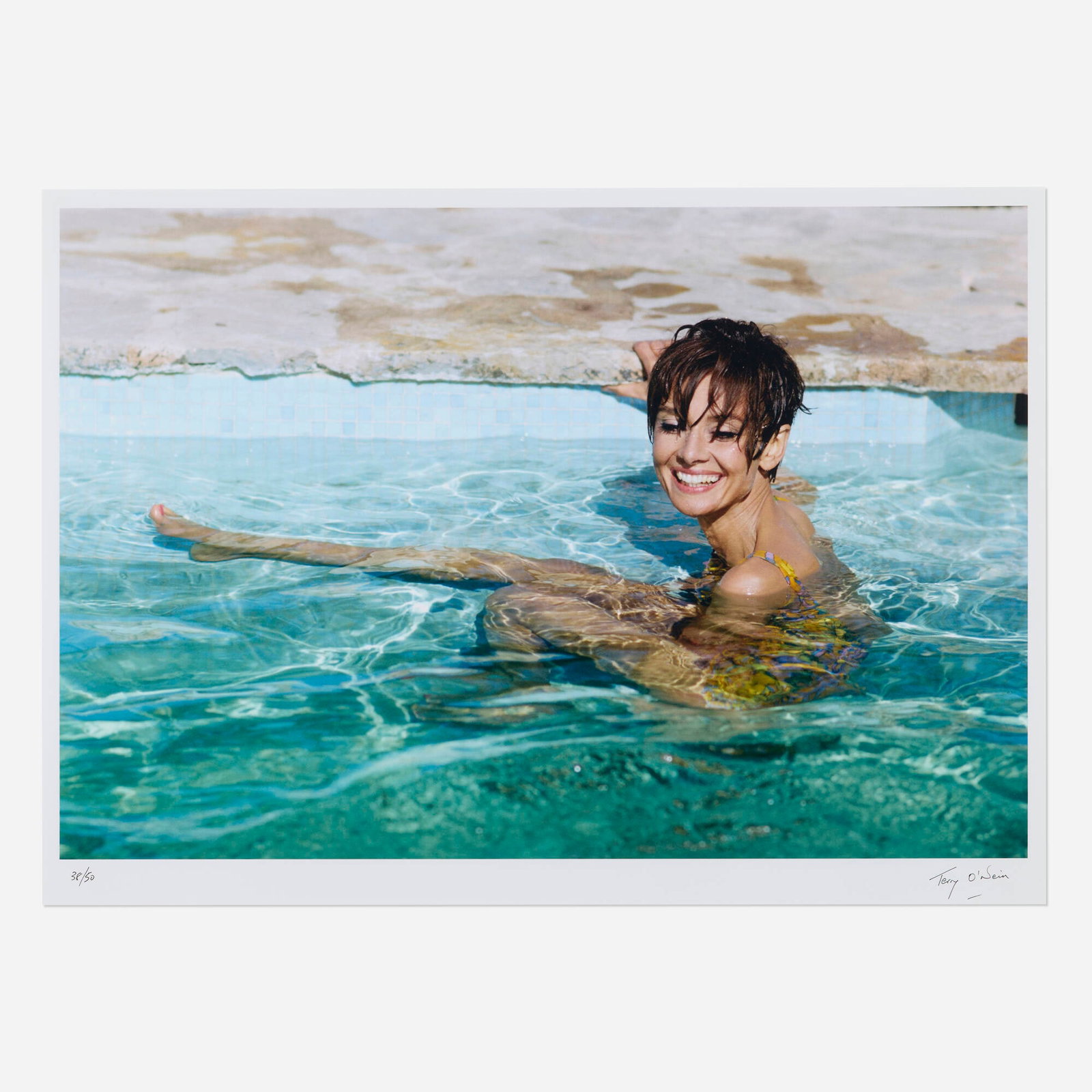 Terry O'Neill, Audrey Hepburn in Pool: Terry O'Neill Audrey Hepburn in Pool 1966 / printed later digital C-print mounted to Dibond image: 25 h x 37 w in (63 x 94 cm) mount: 33.5 h x 44.625 w in (85 x 113 cm) Artist's blindstamp to