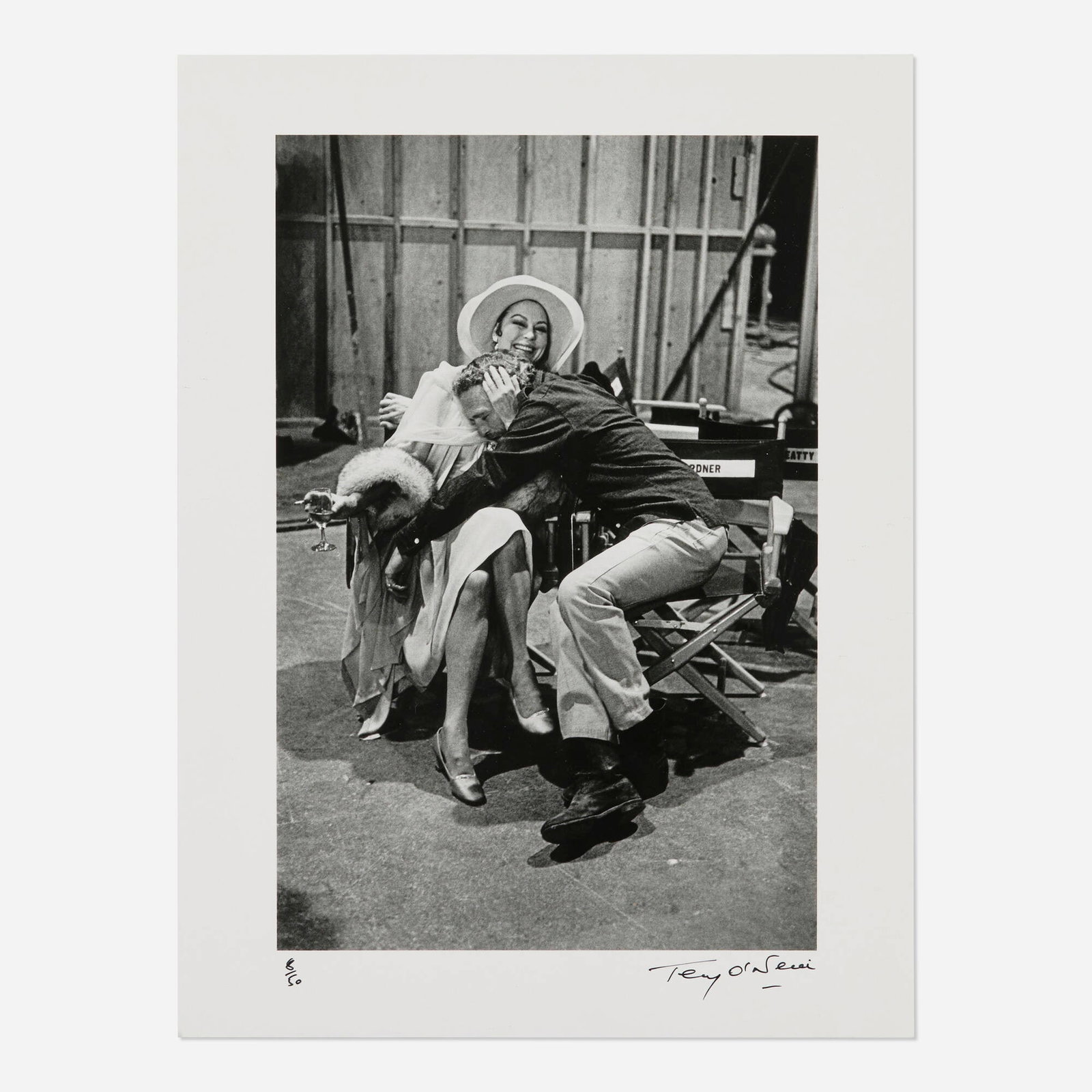 Terry O'Neill, Ava Gardner and Paul Newman on the set of The Life and Times of Judge Roy Bean: Terry O'Neill Ava Gardner and Paul Newman on the set of The Life and Times of Judge Roy Bean 1972 / printed later image: 13 h x 8.625 w in (33 x 22 cm) sight: 15.5 h x 11.5 w in (39 x 29 cm) Signed