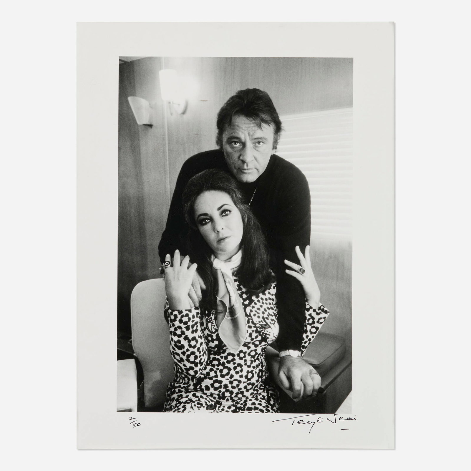Terry O'Neill, Elizabeth Taylor and Richard Burton: Terry O'Neill Elizabeth Taylor and Richard Burton 1984 / printed later gelatin silver print image: 13 h x 8.625 w in (33 x 22 cm) sight: 15.5 h x 11.5 w in (39 x 29 cm) Signed and numbered to lower