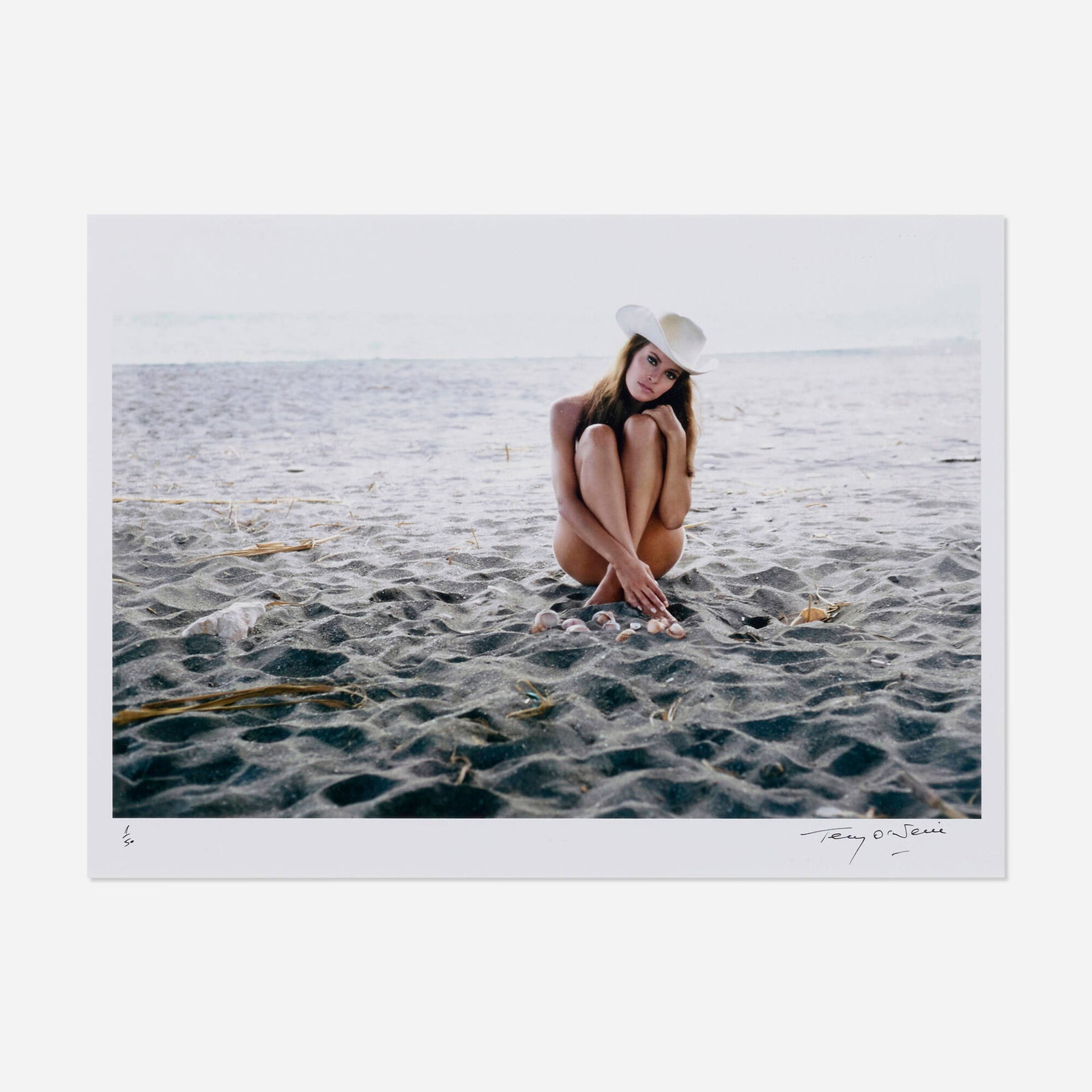 Terry O'Neill, Raquel Welch on the Beach: Terry O'Neill Raquel Welch on the Beach 1966 / printed later image: 12 h x 18 w in (30 x 46 cm) sight: 14 h x 19 w in (36 x 48 cm) Signed and numbered to lower margin '11/50 Terry