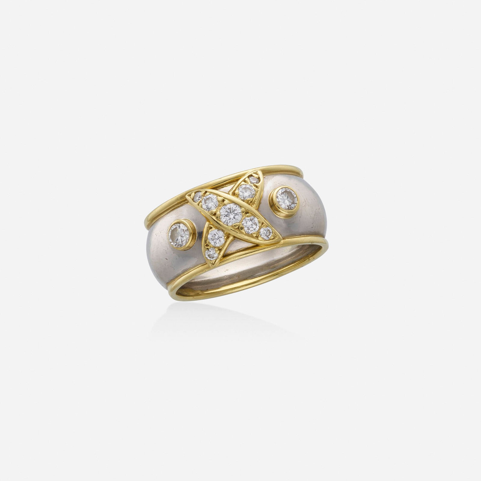 Diamond, gold, and platinum ring: Diamond, gold, and platinum ring Set with an 'X' of round brilliant-cut diamonds Platinum, 18k yellow gold Ring size 6.50; Gross weight 6.6 dwts This work will ship from Lambertville, New Jersey.