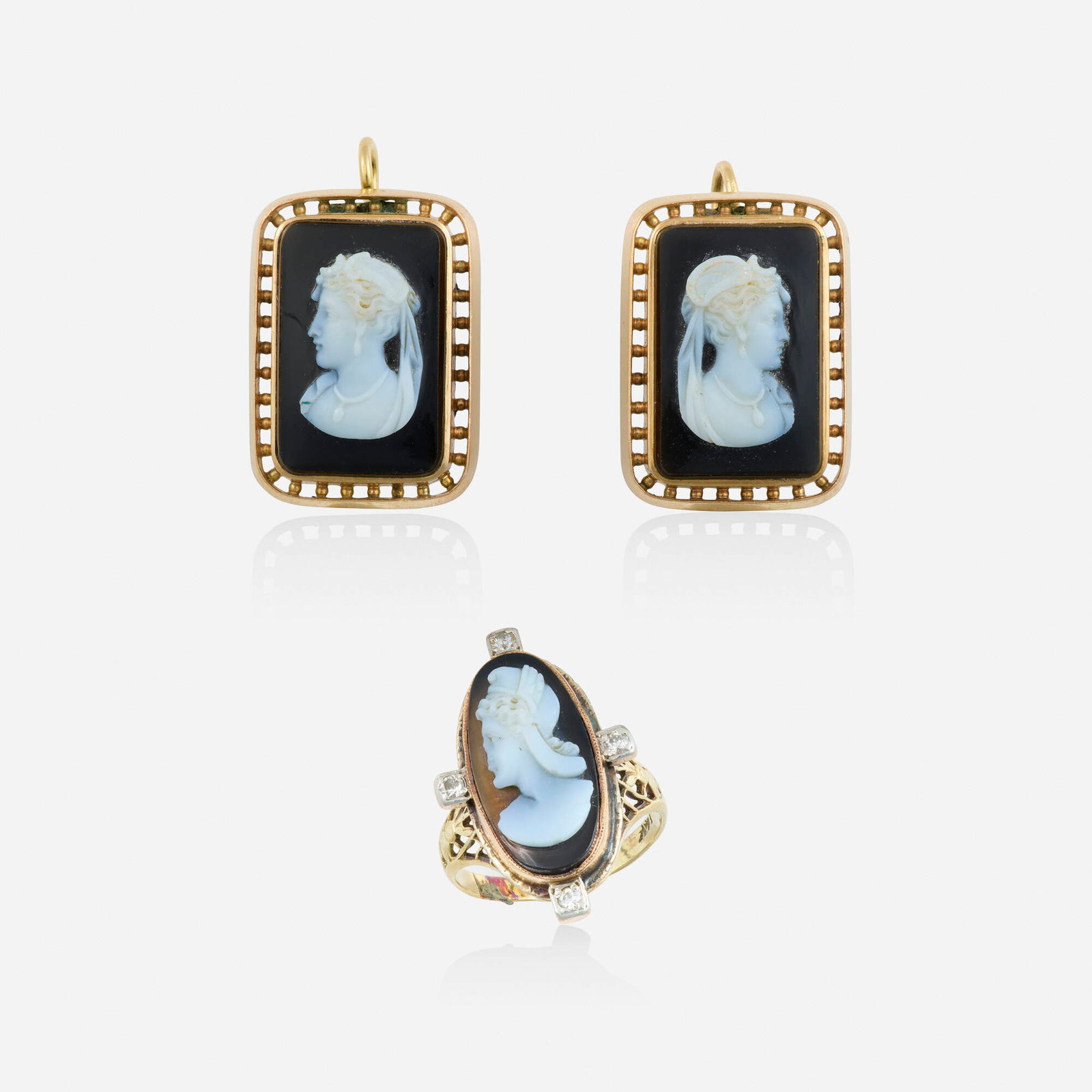 Agate and gold earrings and ring: Agate and gold earrings and ring Each set with an agate cameo, the ring further set with round brilliant-cut diamonds Yellow and pink gold Earrings 1 x 0.625 in, ring size 4.50; Gross weight 8.5 dwts 