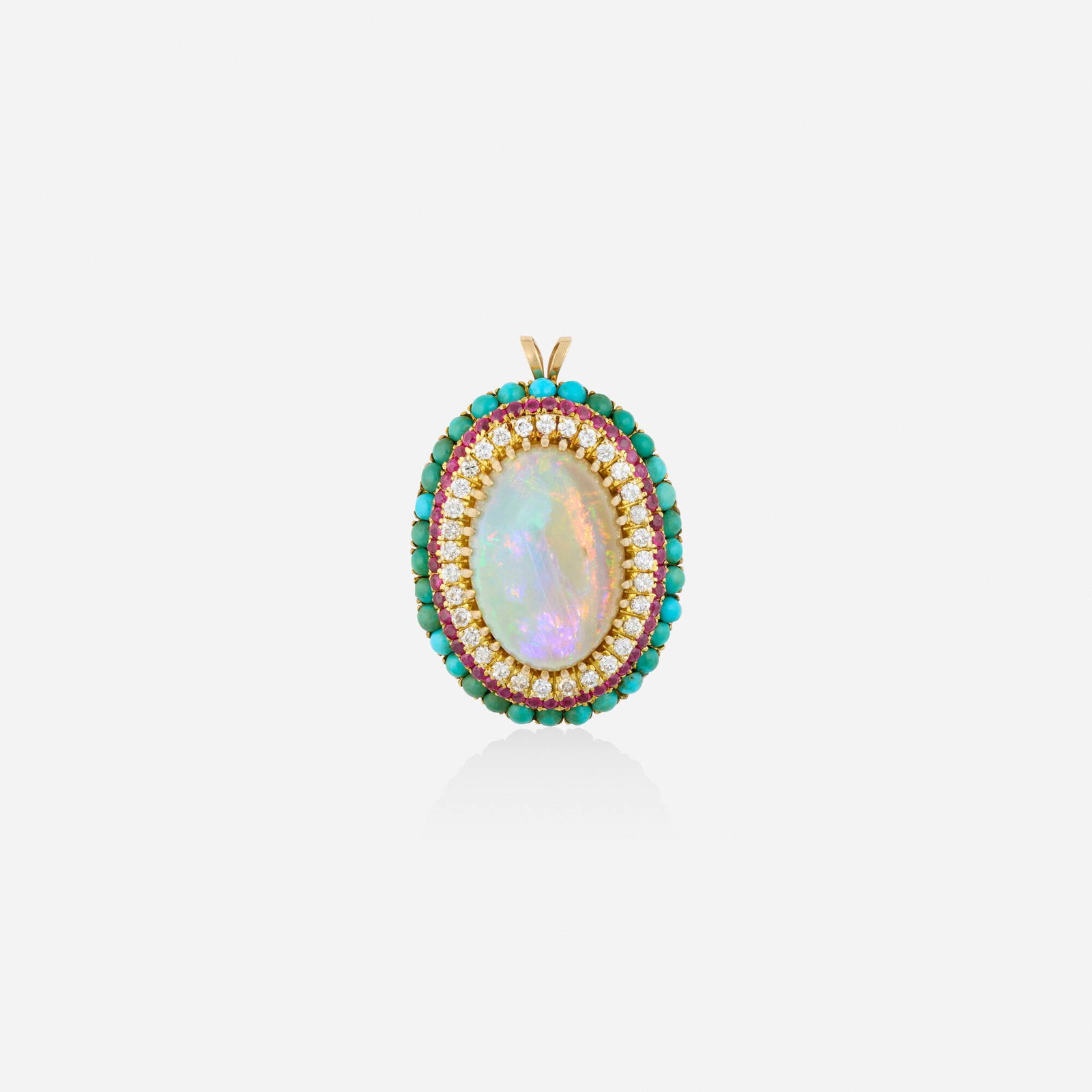 Multi-gem, diamond, and gold pendant: Multi-gem, diamond, and gold pendant Set with a cabochon opal, framed by round brilliant-cut diamonds, circular-cut rubies, and cabochon turquoise Yellow gold 1.50 x 1.125 in; Gross weight 10.7 dwts P