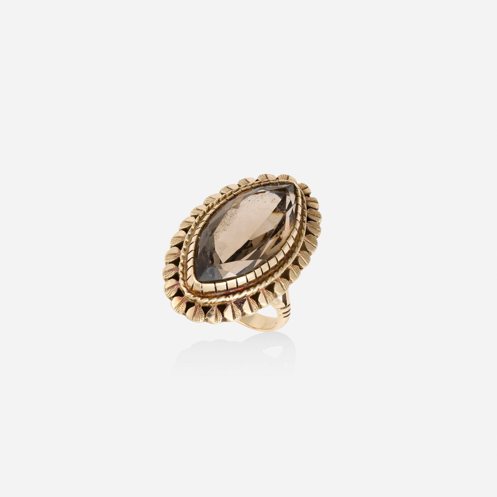 Smoky quartz and gold ring: Smoky quartz and gold ring Set with a marquise-cut smoky quartz 14k yellow gold Ring size 5.50; Gross weight 5.6 dwts This work will ship from Lambertville, New Jersey.
