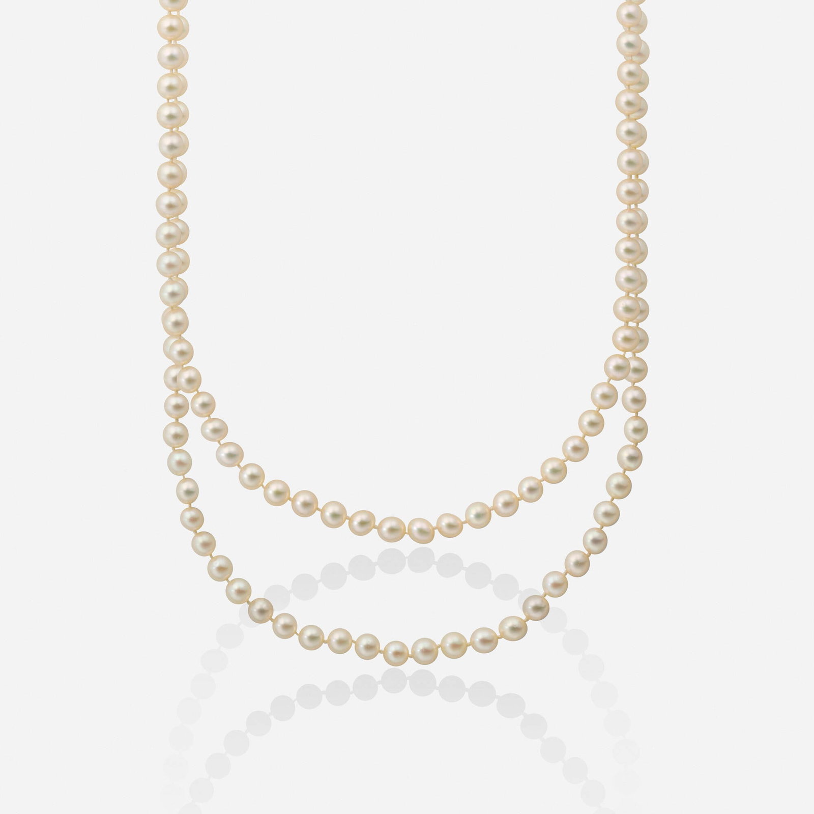 Two cultured pearl necklaces: Two cultured pearl necklaces One of 87 cultured pearls measuring approx. 7.50 mm; and one of 83 cultured pearls measuring approx. 8.00 mm Approx. 28.50 in and 29.50 in; Gross weight 70.0 dwts This wor
