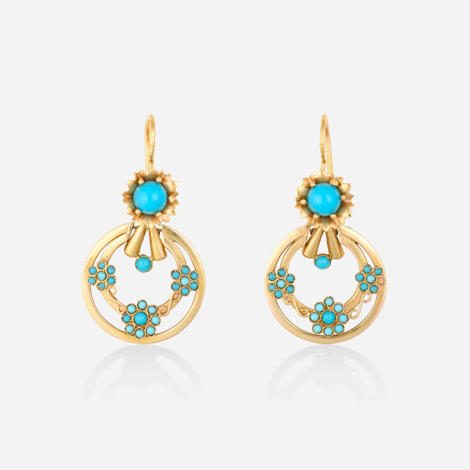 Portuguese, Turquoise and gold earrings: Portuguese Turquoise and gold earrings Of floral design, set with cabochon turquoise 19k yellow gold 1.625 x 0.875 in; Gross weight 3.9 dwts This work will ship from Lambertville, New Jers