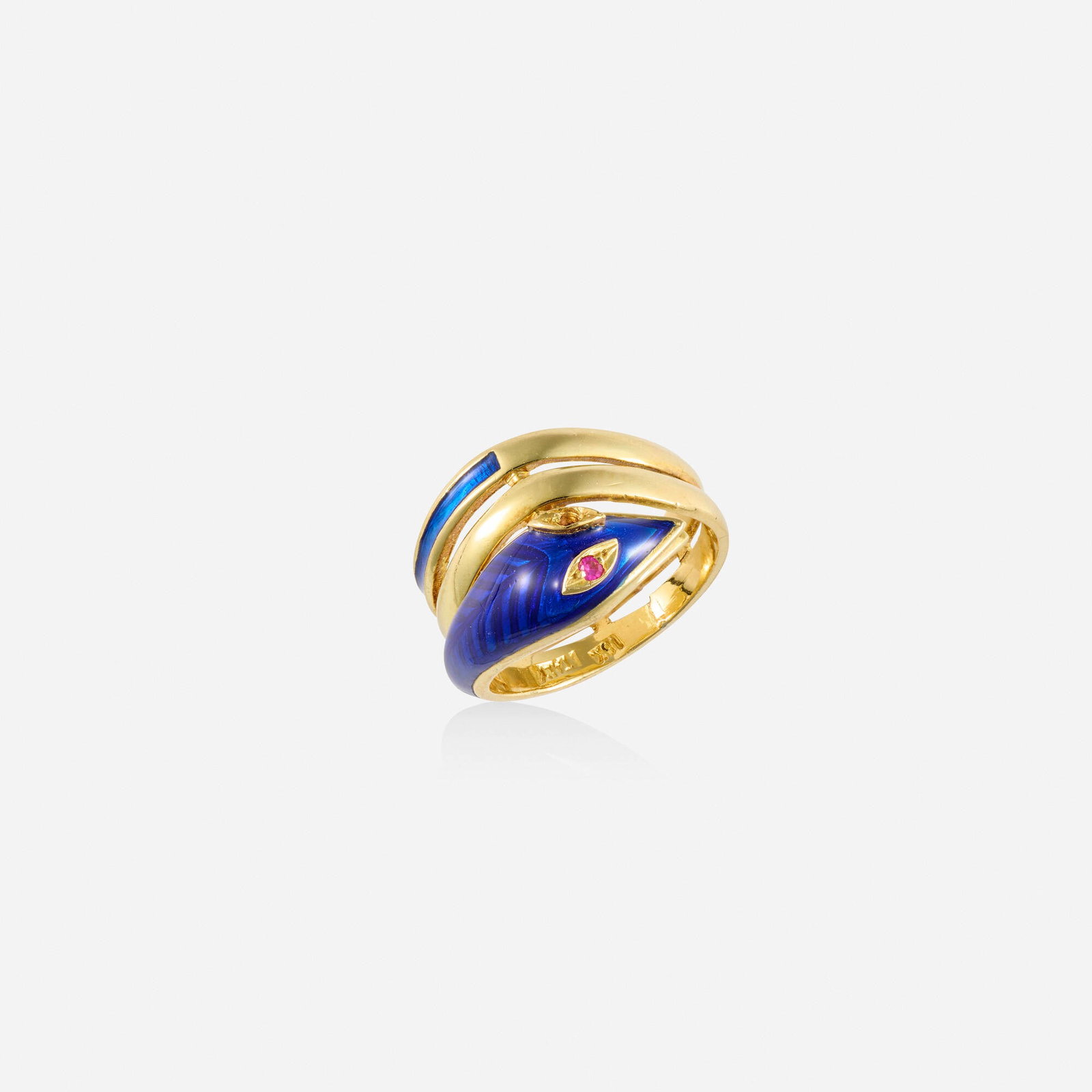 Italian, Ruby, enamel, and gold ring: Italian Ruby, enamel, and gold ring The coiled snake of blue guilloche enamel and circular-cut ruby eye 18k yellow gold Ring size 4; Gross weight 3.5 dwts This work will ship from Lambertv