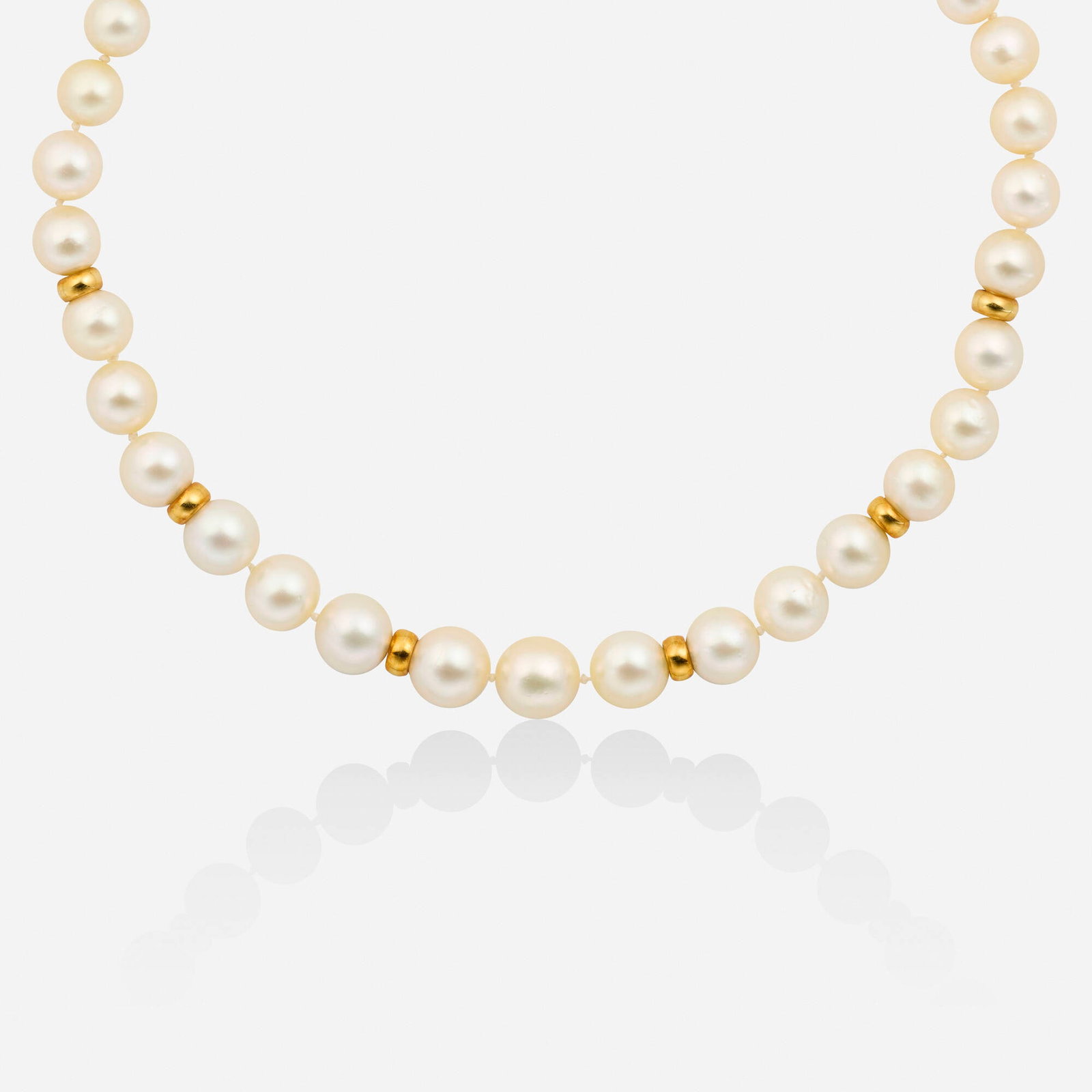 Cultured pearl and gold necklace: Cultured pearl and gold necklace Strung with alternating graduated cultured pearls and gold beads 14k yellow gold 19 in; Gross weight 51.4 dwts This work will ship from Lambertville, New Jersey.