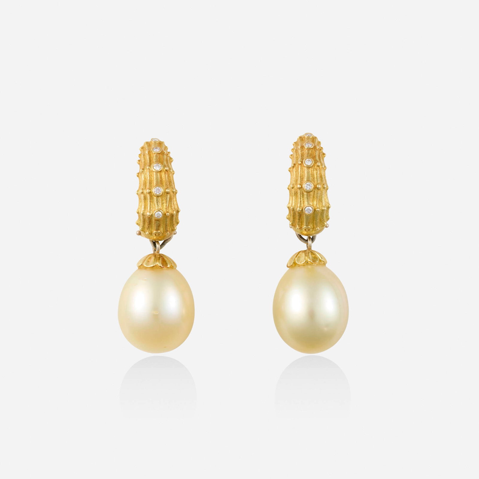 Alex Sepkus, Yellow cultured pearl, diamond, and gold earrings: Alex Sepkus Yellow cultured pearl, diamond, and gold earrings Each of ridged gold set with round brilliant-cut diamonds, suspending a yellow cultured pearl drop 18k yellow gold Signed Alex Sepkus