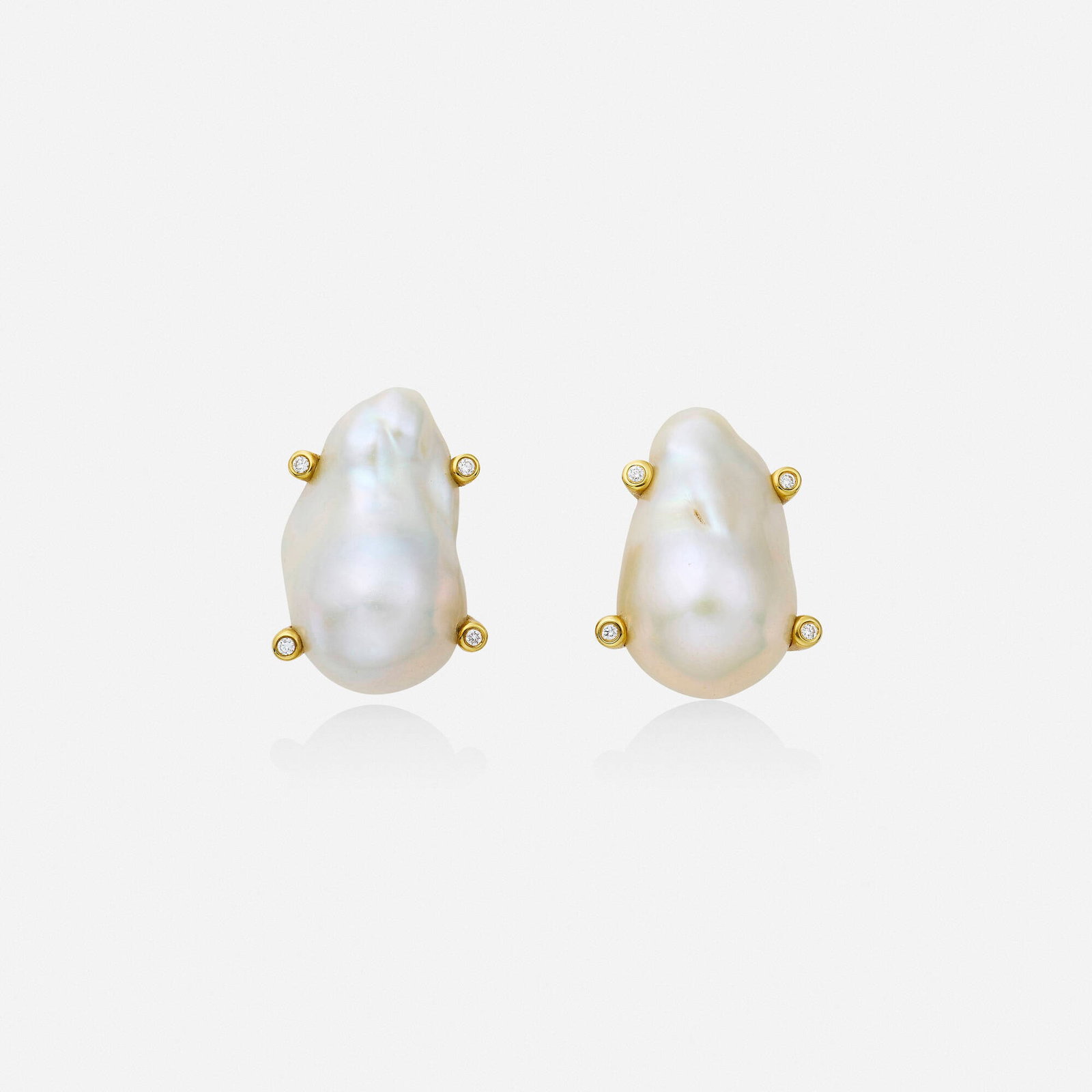 Baroque cultured pearl, diamond, and gold earrings: Baroque cultured pearl, diamond, and gold earrings Each set with a baroque cultured pearl with round brilliant-cut diamond-set prongs 18k yellow gold 1 x 0.75 in; Gross weight 16.6 dwts This work will