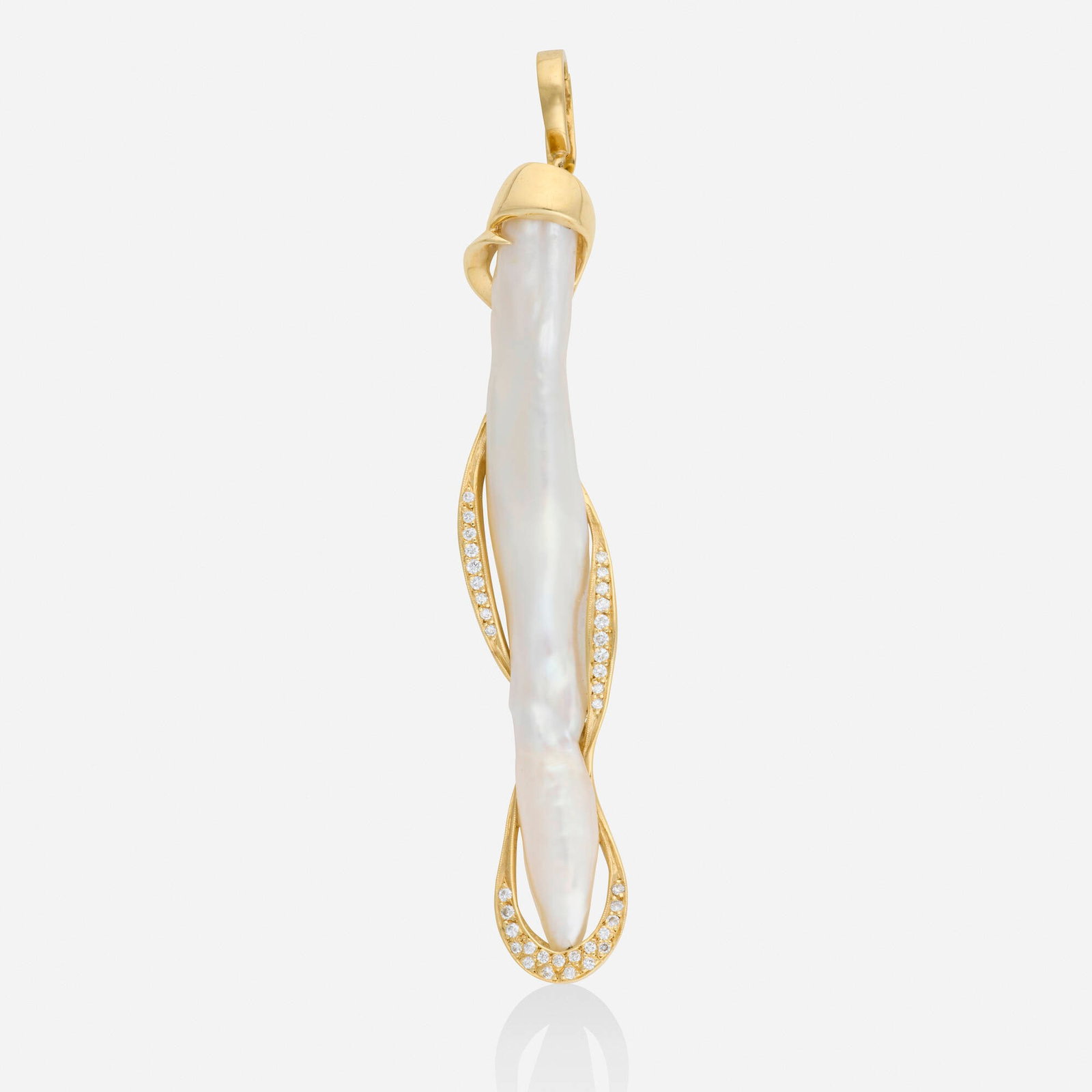 Baroque cultured pearl, diamond, and gold pendant: Baroque cultured pearl, diamond, and gold pendant Set with an elongated baroque cultured pearl and round brilliant-cut diamonds 14k yellow gold 3.625 x 0.625 in; Gross weight 10.6 dwts Provenance: